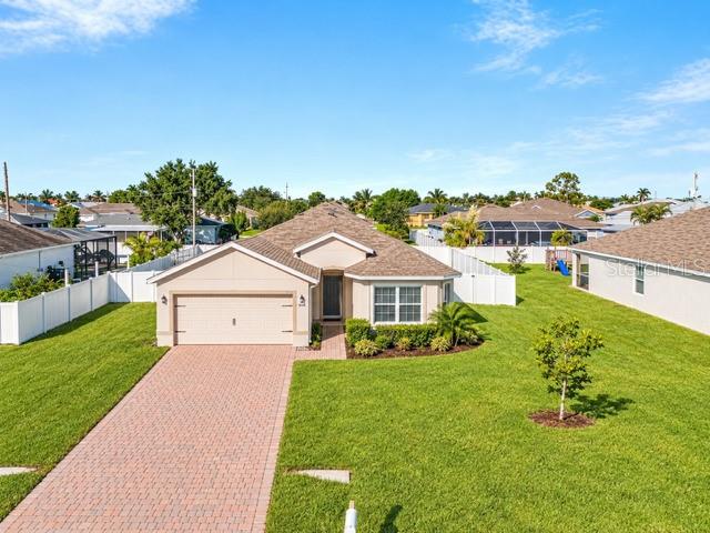 Beautiful 3bed 2bath FULLY FENCED Home, built in 2020, 1,750sqft of living space, NO FLOOD ZONE, ALL ASSESSMENTS PAID, Kitchen boost a big ISLAND with QUARZ COUNTERTOPS, big Breakfast nook, PANTRY, stainless steel appliances, OPEN CONCEPT living, large Living room with sliding doors, spacious Master suite, DOUBLE VANITY, Huge walk in closet, laundry in Residents, split bedrooms, lanai under the truss, lots of room for your pets and future pool, PAVERS IN DRIVEWAY, very quiet neighborhood, Close to shopping, Restaurants and enjoyment