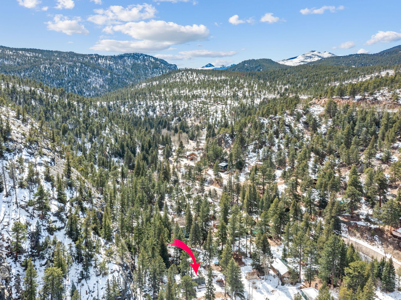 Discover this beautifully updated cabin nestled within the Spruce Vale enclave, where you can find community as well as peaceful privacy. Historically used as a seasonal vacation cabin, it could possibly be winterized for year around use. The cabin offers the luxury of remodeled kitchen and bathrooms, custom lighting, vaulted ceilings, a fireplace with a wood burning insert, gleaming wood floors together with new double pane windows and French doors that lead to outdoor living space, complete with perennial gardens. The exterior upgrades include new concrete siding, a metal roof, a permitted septic system and groomed yard. For the outdoor enthusiast the Riverside area is centrally situated within a short drive to Indian Peaks Wilderness located in Arapaho National Forest and Roosevelt National Forest as well as near proximity to the Wild Basin entrance to Rocky Mountain National Park. The surrounding mountain communities of Allenspark, Jamestown, Ward, Nederland and the Gateway town of Lyons feature eclectic dining experiences with delicious food, gift shops full of local artisan finds, music/art festivals and so much more. Multiple disclosures are posted on MLS for Buyers agent to provide Buyer. Come see this great cabin!