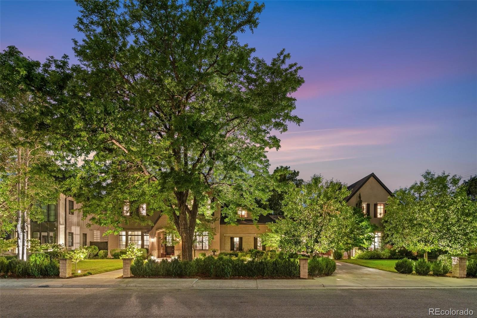WOW!!! - This property is unbelievably awesome - Situated on a 15,620 sq. ft. lot, this 6-bedroom, 11-bath home boasts over 12,400 ft on an incredible block in one of Denver's best neighborhoods. Surrounded by mature landscaping, this home is large but maintains the warmth and coziness of a great family home. The home is drenched in natural light and offers both generous-sized formal and informal living spaces. The first floor features formal living and dining rooms, a large light-filled family room connected to the Chef's kitchen - with easy access to the private outdoor living spaces and the backyard. Off the kitchen is a sunny conservatory and a separate mother-in-law private suite -perfect for guests or a live-in nanny.  The second story has 4 en-suite bedrooms with vaulted ceilings, including an incredible primary suite with a marble bathroom and large walk-in closet. Also on the second floor is a nice-sized laundry room. The lower level has high ceilings, includes a temperature-controlled wine cellar, a large family room with bar, golf simulator, movie theater, tons of storage, and another en-suite bedroom. ATTENTION CAR LOVERS - This home has 10 heated garage spaces, including an automobile lift, and enough room to work on cars. (This area also doubles as extra entertaining space) Located close to everything Denver has to offer - you will be hard-pressed to find a finer home.