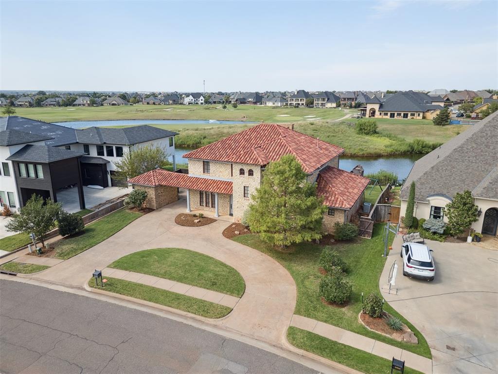 Great opportunity to start with equity on this Rose Creek home! Sitting on 18 fairway and backing to the lake, this home is prime for someone to put their personal touch throughout!  2 Bedrooms with En Suites downstairs plus another 2 bedrooms with Jack n Jill upstairs!  Also an oversized bonus room with a half bath that could easily be converted into a 5th bedroom if desired!  20ft+ ceilings in the living room with windows overlooking the lake and golf course!  2 car attached plus a 3rd car garage!  Tons of potential!  Contact the listing agent for your private showing today!