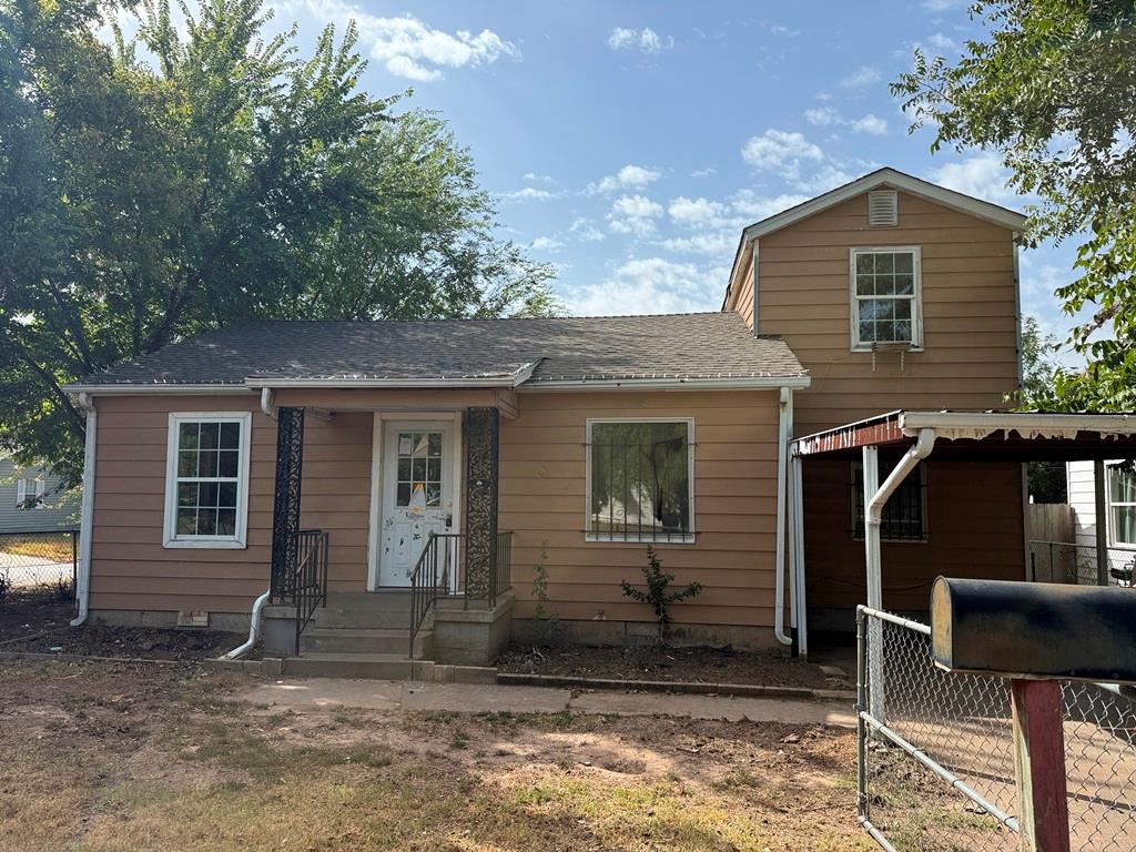 Great opportunity with lots of potential! Situated on a large corner lot, this property offers plenty of space and possibilities. The home needs some repairs and updates, making it a great option for an investor or buyer ready to add their personal touch. Additional living space upstairs provides added flexibility. Bring your ideas and make this property your own!