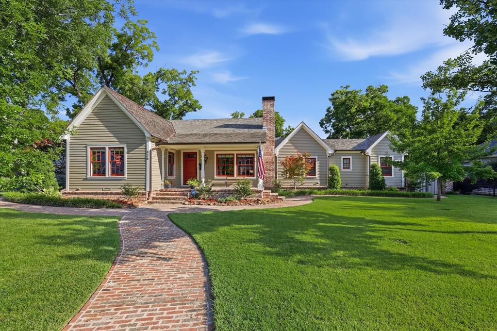 Welcome home to where timeless craftsmanship meets modern luxury. Located in Grapevine’s Historic District and just a short walk to vibrant Main Street, this extraordinary residence is truly one of a kind. Thoughtfully reimagined by the current owners, every detail has been meticulously curated to blend classic architectural character with today’s refined finishes and sophisticated design. The custom open-concept floor plan showcases reclaimed Amish Oak hardwood flooring, reclaimed wood beams, Anderson custom windows, and exceptional craftsmanship throughout. Designed for both everyday living and entertaining, the gourmet kitchen features a hand-painted tile backsplash, an oversized island with breakfast bar, a 6-burner Wolf gas cooktop, three ovens, a built-in coffee maker, Sub-Zero refrigerator, farmhouse sink, and premium stainless steel appliances. The seamless transition to outdoor living is equally impressive, highlighted by a 32’ x 13’ covered patio with motorized shades overlooking the sparkling pool and spa. The detached two-car garage includes a private upstairs guest suite or bonus room with hardwood flooring and a full bath, offering endless flexibility for guests, a home office, or studio. The single-story main residence offers a spacious primary suite, a second ensuite bedroom, an additional guest bedroom, guest bath, and a dedicated study. Your search will be over as soon as you experience this property for yourself. Every inch of this remarkable home reflects unparalleled quality, thoughtful design, and timeless elegance. Per the owner, the detached carriage house offers approximately 480 additional square feet of guest quarters above the secondary detached garage. This space is not included in the main residence’s 2,790 square feet as reported by the Tax Assessor.