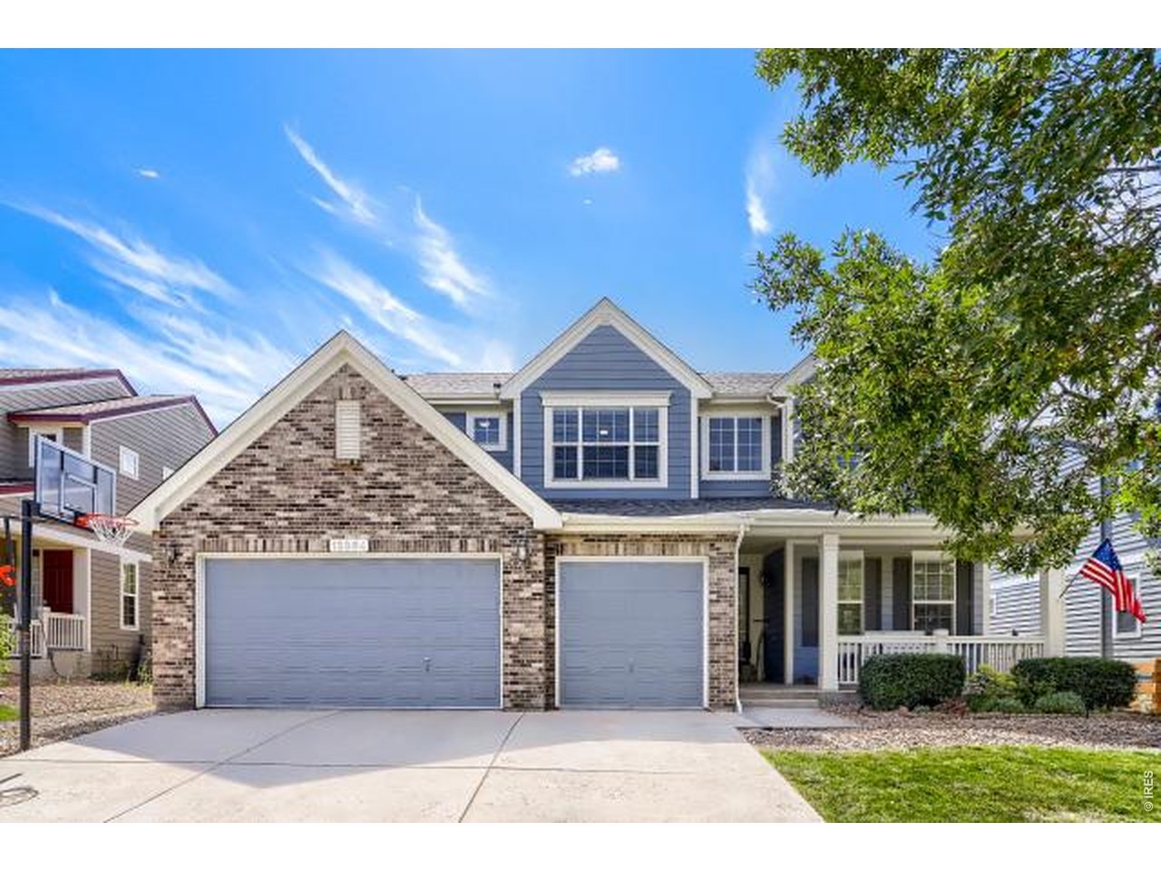 Welcome to this spacious, light-filled 6-bedroom, 3.5-bath home in the desirable Village of Five Parks neighborhood. From the moment you enter, you are greeted by soaring ceilings, a dramatic two-story foyer, and an elegant, curved staircase. Designed for daily living and effortless entertaining, the main level offers a formal living room, formal dining room, and a massive two-story great room centered around a cozy gas fireplace. At the heart of the home is a renovated designer kitchen (2021-2024)with quartz countertops, an upgraded tile backsplash, an island, open shelving, a convenient pot filler, double ovens, pantry, stainless steel appliances, plus a bright breakfast nook. The main floor also features a half bath, a dedicated bedroom or office with a walk-in closet, and a laundry room with a utility sink and storage/folding area. Upstairs, retreat to the oversized primary suite featuring a spacious ensuite bathroom with dual vanities and walk-in closet. Three additional upper-level bedrooms share a full bath with dual vanities. The fully renovated basement (2025) is ideal for guests or multi-generational living, featuring a bedroom with an ensuite 3/4 bath and walk-in closet, alongside a large family room, an additional recreation room, plus several egress windows for extra light and comfort. As a bonus, the home has a 3-car garage. What the next buyer will appreciate most is all the updates and upgrades: NEW ROOF(June 2026), Furnace/AC with humidifier(2024), interior paint (2021above grade/2025 basement), exterior paint (2022, refreshed 2026), updated carpet throughout(main & upper levels 2021, basement 2025), updated landscaping with an automated irrigation system (2025), a paid-off solar system for reduced energy bills, and space for everyone! This home offers the ultimate blend of functional space, high-value updates, and community charm, giving you complete peace of mind where it counts most. Set up your showing today!