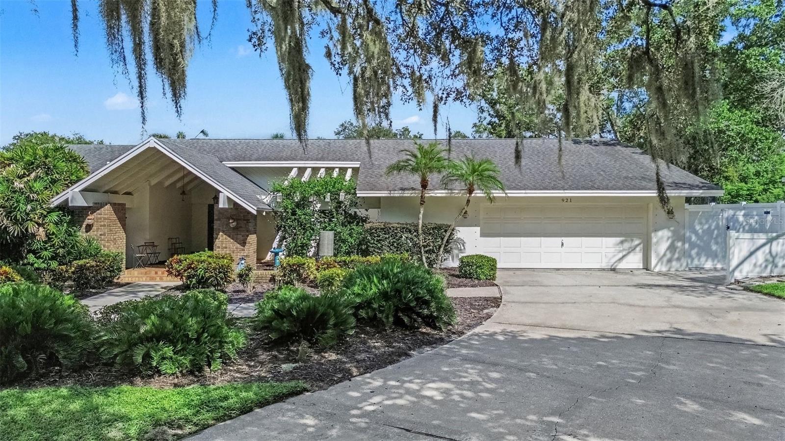 Welcome to this exceptional Clearwater pool home in the desirable Hillcrest Estates neighborhood! This spacious 4-bedroom, 3.5-bath residence offers nearly 4,000 square feet of living space on a generous 0.42-acre lot. The inviting layout features formal living and dining areas, soaring ceilings, a spacious family room with fireplace, and a beautiful chef’s kitchen with wood cabinetry, Corian countertops, and a large island. The expansive primary suite offers three walk-in closets, a fireplace, and a luxurious en-suite bath. Enjoy Florida living from the bright Florida room overlooking the private pool and beautifully landscaped backyard. A large bonus room provides flexible space for an office, gym, media room, or guest suite. Additional highlights include a two-car garage with workshop space and no HOA. Conveniently located near shopping, dining, parks, major roadways, and Clearwater’s beautiful beaches.