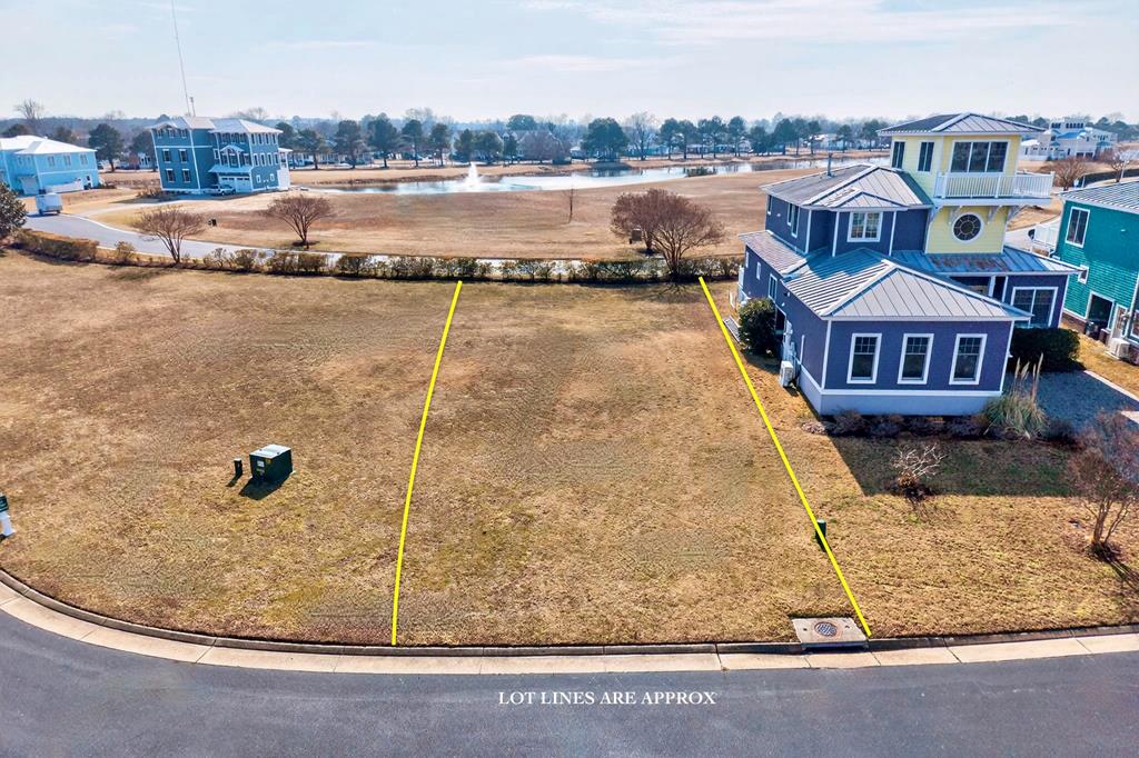 Homesite 155 in the Kings Bay section of Bay Creek is ideally positioned in a  cul-de-sac. There is no required timeframe to build, giving you the flexibility to design and construct your dream home. Enjoy the coastal lifestyle with access to community amenities and the natural beauty of Virginia's Eastern Shore. Just minutes from Historic Cape Charles and Cape Charles, you'll love the boutique shopping, local dining, marinas, and year-round events. Call listing agent for more information today!