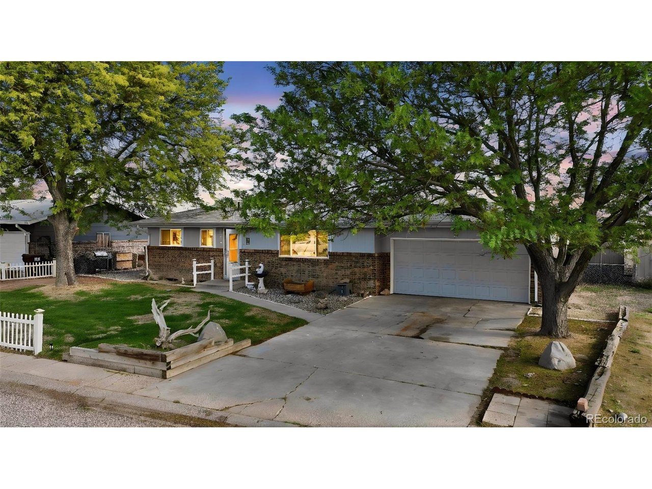 Beautifully updated, move-in ready 5-bedroom, 2-bathroom ranch home nestled in the established Sunset Heights neighborhood of La Salle. With 2,004 finished square feet, fresh interior paint, new hardwood floors, and refreshed cabinetry, this home is truly turnkey from the moment you walk in. The inviting sunroom adds an additional 216 square feet of flexible living space - perfect for a home office, playroom, or morning coffee retreat. The fully finished basement offers three additional, non-conforming, bedrooms and a 3/4 bath with a walk-in shower, providing the space and versatility every household needs. Major systems have been updated including a newer furnace, water heater, and central AC, giving you confidence and peace of mind from day one. Outside, enjoy a fully fenced backyard that backs to open space, complete with a pergola, raised garden beds with a built-in water system, and refreshed landscaping - ideal for enjoying Colorado's outdoor lifestyle. An attached 2-car garage, dedicated RV parking with hookups, and two storage sheds round out this incredible package. No HOA, no metro district, and low property taxes make this an exceptional opportunity in Weld County. Conveniently located near schools, parks, and everyday amenities with easy access to I-25 and the broader Northern Colorado corridor. This one checks every box - come see it before it's gone!