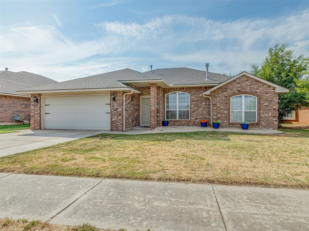 0% DOWN USDA FINANCING AVAILABLE! That opportunity alone makes this move-in ready 3 bed, 2 bath home worth a closer look. Inside, the open concept layout is bright, inviting, and filled with natural light. New hard surface flooring runs throughout the main living areas, while the bedrooms feature fresh carpet. Fresh paint gives the entire home a clean, updated feel. The living room centers around a cozy gas-log fireplace, creating a comfortable space to relax or entertain. The oversized primary suite includes a large walk-in closet plus a private en-suite with a garden soaking tub and separate walk-in shower. An extended front patio adds extra outdoor living and decorating space. Neighborhood amenities include a community park, pond, walking trails, and basketball court. Located in the Edmond School District, this home offers updates, space, amenities, and the major advantage of qualifying for a 0% down USDA loan. Schedule your viewing today!