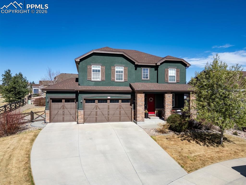 This property is a beautiful, five bed, four bath 3200 square-foot home built in 2014. The home features a gourmet kitchen with double ovens, stainless steel appliances and quartz countertops. The main level has hardwood floors throughout along with a beautiful office/school room. There are four bedrooms upstairs, including the primary suite with a five piece bathroom and a large walk-in closet. Three of the four other secondary bedrooms are located upstairs along with a laundry room and a secondary bathroom. The basement has a large family room and a nice bedroom suite area for potential guest or multi generational living. The home has an attached three car garage along with a nice backyards and views of Pikes Peak. The backyard has a stamped concrete patio. This property is also less than a three minute walk from the Banning Lewis Ranch rec center. The property has new paint inside and out, the new sliding glass door to the backyard and is stucco and stone exterior. Come see this fantastic Banning Lewis Ranch opportunity.