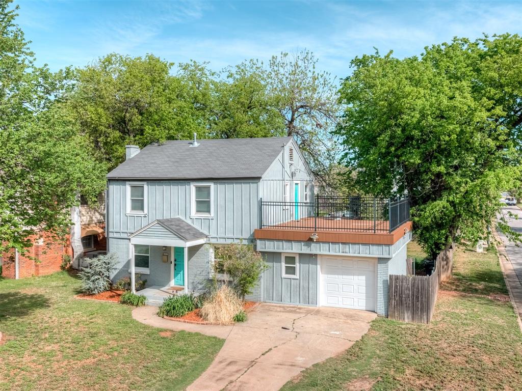 Corner-Lot Charmer with Iconic Balcony in OKC Metro!!Just minutes from the Plaza District, this standout home blends modern updates with character you simply won’t find anywhere else. Positioned on a spacious corner lot, it offers striking curb appeal, a rare oversized balcony, and a backyard built for both relaxation and entertaining.Inside, warm wood floors, soft gray tones, and crisp white trim create a clean, inviting aesthetic filled with natural light. The open living and dining spaces feel both comfortable and elevated, anchored by a charming fireplace that adds just the right touch of character.The kitchen is thoughtfully designed with granite countertops, stainless steel appliances, ample cabinetry, a walk-in pantry, and a dedicated wine fridge—perfect for everyday living or hosting with ease.Upstairs, generously sized bedrooms offer flexibility and privacy, each featuring walk-in closets and a cohesive, modern feel. With a full bath on each level, the layout is both practical and functional.Step outside to your own private retreat—an expansive backyard with mature trees, a tranquil koi pond, and a custom oversized patio crafted from authentic late-1800s street pavers, each stamped with history from across the U.S. It’s a true conversation piece and an entertainer’s dream.And the showstopper—an oversized Trex balcony overlooking the yard, ideal for sunset evenings, grilling, or gathering with friends under string lights.Additional highlights include a 1-car garage, interior laundry, sprinkler system, water softener, smart home features, and a security system.Unique, stylish, and move-in ready—this is the kind of home buyers remember!