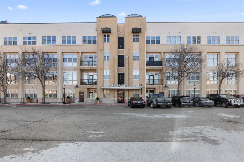 Experience the best of downtown Fort Worth living in this spacious 2-bedroom, 2-bath condo in the highly sought-after T&P MID-RISE, just minutes from the vibrant energy of SUNDANCE SQUARE. Designed for MODERN URBAN LIVING, this open-concept home features GRANITE COUNTERTOPS, STAINLESS STEEL APPLIANCES, STAINED CONCRETE FLOORS, OVERSIZED CLOSETS, and a FULL-SIZE WASHER AND DRYER. Abundant NATURAL LIGHT fills the space, while recent updates—including FRESH PAINT, NEW BLINDS, and NEW CEILING FANS—add a crisp, MOVE-IN-READY feel.Residents enjoy FULL-SERVICE AMENITIES, including a 24hrs FRONT DESK CONCIERGE, FULLY EQUIPPED FITNESS CENTER, RESORT-STYLE POOL, and INVITING COMMON AREAS, all designed to elevate everyday living. Step outside and immerse yourself in everything downtown has to offer. From FINE DINING and LIVE MUSIC to THEATERS, ART GALLERIES, BOUTIQUE SHOPPING, and YEAR-ROUND EVENTS, it’s all just steps away. With SUNDANCE SQUARE AS YOUR BACKYARD, enjoy effortless COFFEE DATES, HAPPY HOURS, and LEISURELY WEEKEND STROLLS in one of Fort Worth’s most iconic destinations.Commuting is a breeze with immediate access to TEXRAIL and TRE COMMUTER LINES, plus FORT WORTH BIKE SHARE conveniently located across the street. The building’s SMART CALL-BOX SYSTEM connects directly to your phone, allowing you to grant guest access with ease. URBAN CONVENIENCE, MODERN STYLE, and an UNBEATABLE LOCATION—this is downtown Fort Worth living at its finest. DON’T MISS THE OPPORTUNITY TO MAKE IT YOURS.