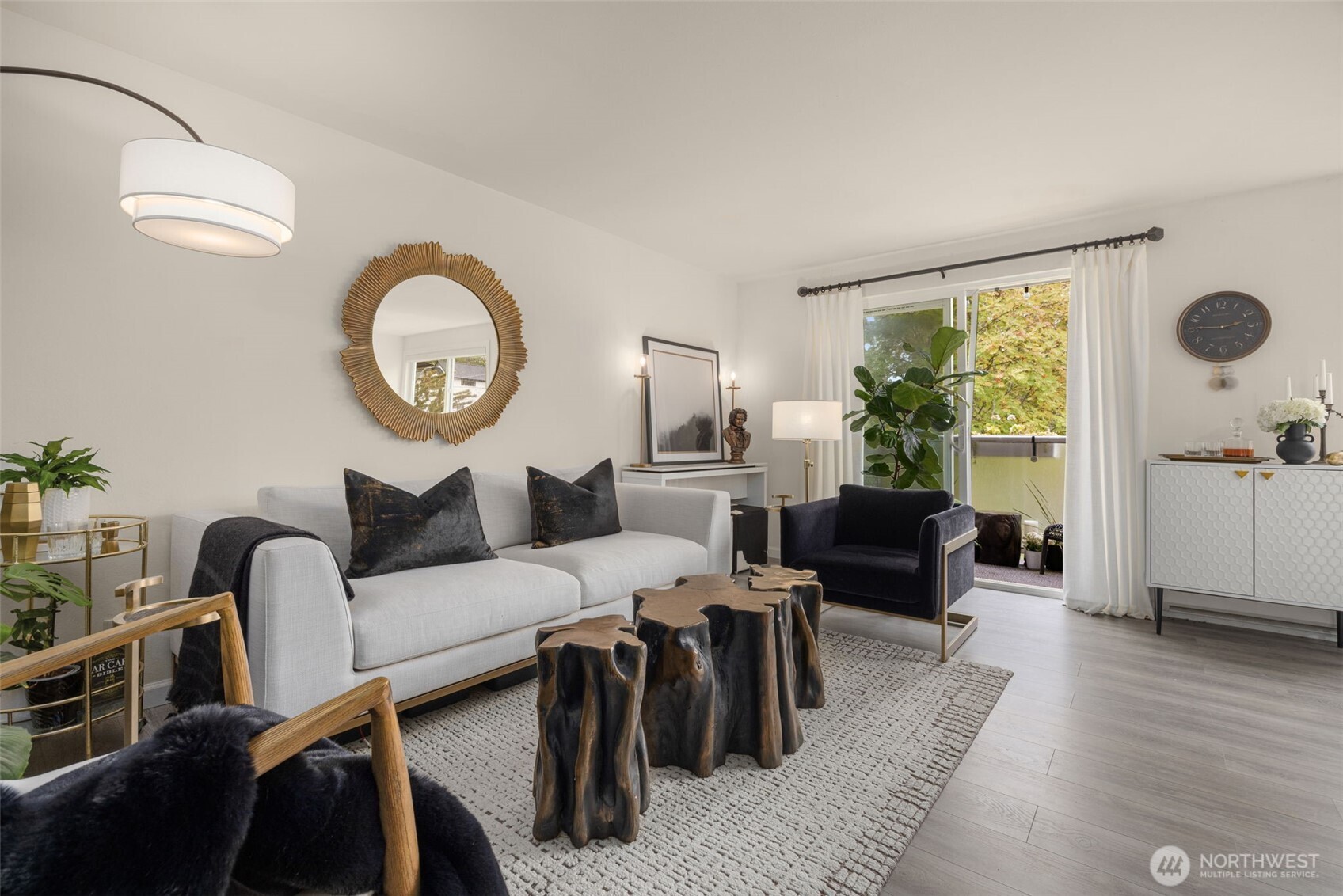 Light-filled top-floor unit in the heart of Wedgwood! This charming 1-bedroom, 1-bath home offers an inviting blend of comfort, updates, and convenience. This unit lives large, with an open living room & dining room with access to private south-facing deck.  Updated lighting adds to the home’s bright & polished feel.  Located in a well-run, 100% owner-occupied co-op with strong HOA management.  The monthly dues cover property taxes, internet service,  earthquake insurance, water, sewer & garbage - WOW!  Ideally situated within easy walking distance of bus lines, coffee shops, dining, and neighborhood shopping. A wonderful opportunity to own in one of Seattle’s most desirable close-in neighborhoods—why rent when you can own?