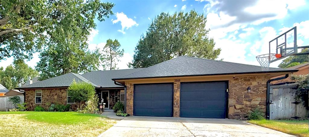 MUST SEE this charming rock home with a great front porch and POOL in an excellent Brookhaven location! Walk to Truman Elementary and park. 3 bedrooms, 2 1/2 bathrooms and a fenced POOL as a bonus!  Seller purchased home based on an licensed appraiser measurements of sq. ft. with the sunroom added on, therefore, Sunroom addition with its own HVAC is not included in the sq. ft. listed on the County Assessor website. Sunken living rom has hand scraped engineered wood flooring and built-ins. French doors in dining are beautiful and it could easily be used as an office. Main bedroom has 2 closets, a cozy but functional bathroom along with sliding glass doors that allow easy pool access and view. Storm shelter is in garage floor. Bathrooms updated (2020) all new windows (2021). Hail resistant roof (2020), HVAC  (2018).  TV mounted in sunroom stays. Living room mounted TV is negotiable. There is a space on west side of house perfect for a dog run. Shed on east side for pool and  yard supplies.