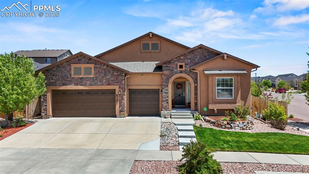Welcome to this beautifully maintained, one-owner custom ranch home, offering the perfect blend of quality, comfort, and thoughtful design.Inside, you’ll find hardwood floors, 10-foot ceilings, and an open layout filled with natural light. The updated kitchen features stainless steel appliances, ample cabinetry, and flows seamlessly into the formal dining area—ideal for everyday living and entertaining. The main-level primary suite offers a spacious walk-in closet, a ensuite bathroom, and direct access to the laundry room for added convenience. Built-in surround sound can be found throughout the home along with ethernet wiring, making it ideal for remote work, streaming, or smart home integration. With 5 bedrooms and 4 full bathrooms, there’s room for everyone. The fully finished basement expands your living space with a large family room, wet bar, theater area, three additional bedrooms, and two bathrooms featuring heated floors. Additional highlights include whole-home Ethernet wiring, a storage room, and an oversized 3-car garage with insulated doors and overhead storage. Step outside to a private, fully fenced backyard with a partially covered composite deck and a storage shed—perfect for relaxing or entertaining. This home truly reflects pride of ownership and is a rare find!