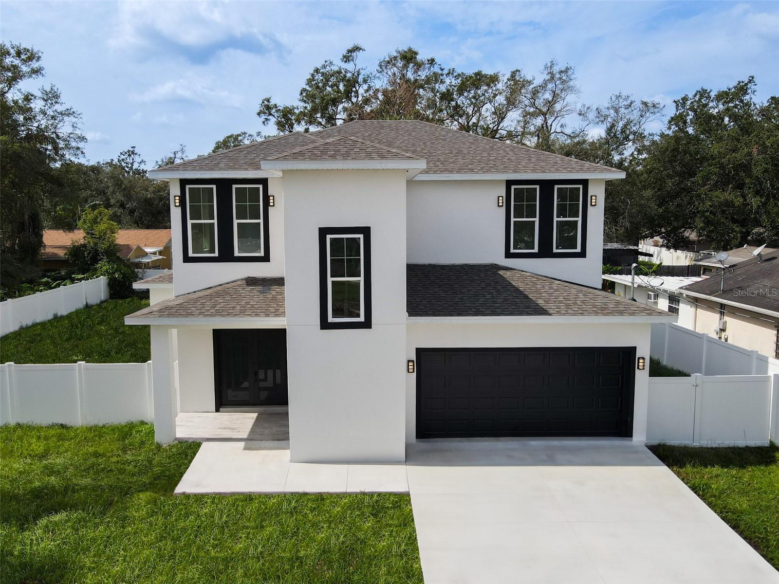 Experience modern living in this thoughtfully designed new construction home, featuring four bedrooms and three and a half bathrooms. With an open-concept floor plan, the main living space seamlessly connects the kitchen, dining, and living areas, ideal for both everyday life and hosting guests.  The first-floor primary suite includes a well-appointed bathroom and provides a private, comfortable retreat. Upstairs, you'll find three additional bedrooms, a laundry room, and a flexible office space to fit your needs.  The kitchen is oversized and functional, complete with modern appliances, plenty of cabinet storage, and a central island that works just as well for meal prep as it does for casual dining.  Step outside to a private terrace, perfect for outdoor dining or relaxing in the Florida sun. Large windows throughout the home let in plenty of natural light, highlighting the clean, modern finishes and creating a bright, open feel.  All of this just a 10-minute drive to vibrant Downtown Tampa!