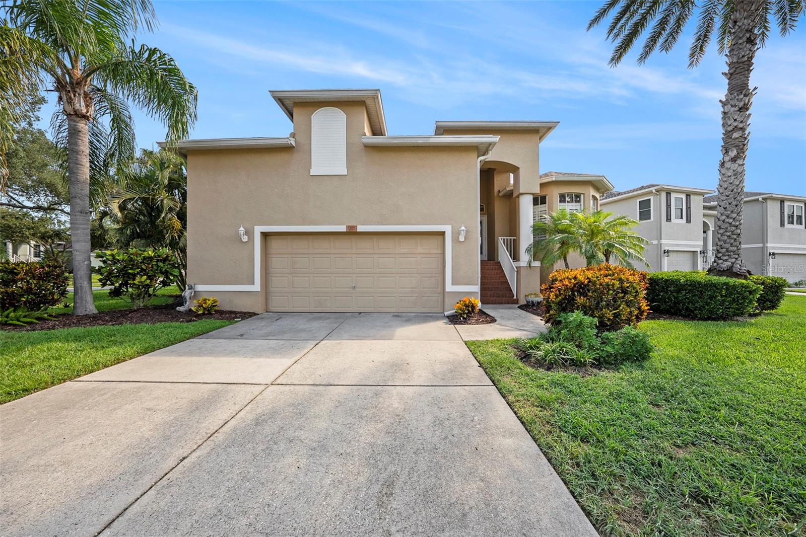 Welcome to this dream elevated three bedroom, two bath home, a true coastal oasis in the heart of Tarpon Springs. This stunning home is perfectly positioned on a spacious corner lot surrounded by beautiful and meticulous landscaping & highlighted by a gorgeous pond view that captures the essence of the coastal lifestyle of the residents of Pointe Alexis South Subdivision.  As you step through the front door, you'll be greeted by how open and spacious the home is with its glowing hardwood floors, surrounded by windows for amazing natural lighting and Plantation shutters throughout. The large kitchen with granite countertops flows seamlessly to the dining and living areas and is the true center and heart of the home.  The master bedroom is a suite complete with an en-suite bathroom including jacuzzi tub and large professionally designed California walk-in closet system.  The other two (2) bedrooms are large with a 2nd full bathroom. And, this home has an oversized garage with ample storage.  Pointe Alexis is a deed restricted community offering luxury amenities at low HOA rate that includes clubhouse with pool, water, cable, internet service, full landscaping and lawn care for every home, pest control, and more! As a real gem, this home comes with a Transferable FEMA Insurance that is approximately $900 annually!  This home has it all!!!  Act fast as it will not last long!