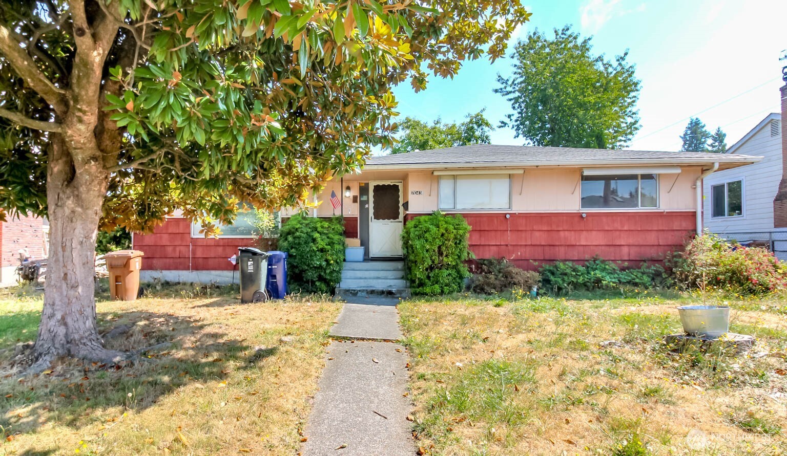 Welcome to this Tacoma gem with great potential. This charming 3-bedroom, 1.75 bath home offers a fantastic opportunity for a first-time homebuyer to build equity or for an investor seeking strong value and flexibility. The finished basement includes a 3/4 bath, wood burning fireplace, bonus room and offers the potential for a separate living area, with a separate entry that could be ideal for guests, a tenant setup or multi-generational living. You will appreciate the convenience of a detached garage plus ample parking with alley access. There are original hardwood floors and character throughout, and an inviting layout that includes a large, covered patio. The main level features three bedrooms, an eat in kitchen and a dedicated dining area plus a spacious living room featuring unique ceiling details and a wood burning fireplace that add to the homes charm. This home is a standout value in Tacoma.
