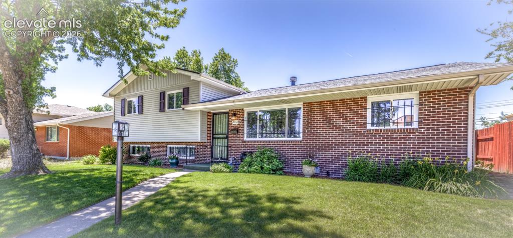 Beautifully professionally renovated 2035 sq ft, 4 bedroom, 2 bath, 1960's tri-level ~ 2 car detached garage (23x23), water feature with water fall~ Wood burning fireplace ~ Light & bright & almost everything is new including: interior & exterior paint, refinished "like new"  hardwood floors, vinyl windows, lighting (inside & out), electrical panel, switches, outlets, patio cover & indoor & outdoor carpeting on patio & front porch, luxury carpeting & pad, disposal, refrigerator & blinds ~ 3 year old roof, 4 1/2 year old furnace & humidifier, 2 year old electric water heater ~ Professionally cleaned including grout, blinds, tile & windows ~ X wall insulation keeps the home cool without the need for a/c ~ furnace just serviced & tile & grout refinished ~ Beautiful landscaping front & rear with sprinkler system ~ RV parking off ally with double gate. Shows great.  Kitchen is an eat in & the formal dining room is huge & could be a 2nd family room, office, dining combination.