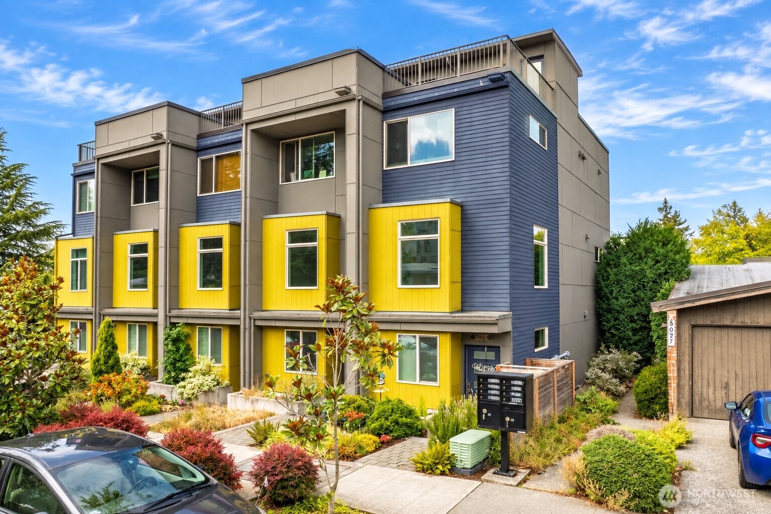 Urban living at its finest. This exceptional one-owner, End-Unit Townhome blends modern style, elevated amenities, and an unbeatable Seattle lifestyle. Soaring, spanning windows fill the home with natural light, while gorgeous hardwood floors add warmth and sophistication throughout.     The chef-inspired kitchen features sleek quartz countertops, soft-close cabinetry & upgraded appliances.     The primary suite with a spa-like bathroom & walk-in closet is a dream!    2 Rooftop Decks provide your own outdoor retreat with space to relax or entertain, from sipping your morning coffee to barbequing with friends.     The lower level doubles as your personal gym or office, and the mini split heat/AC system keeps you comfortable all year round.     Best of all, NO HOA!     Just minutes from the University of Washington and University Village, and blocks from the Metropolitan Market and the Burke-Gilman Trail, you'll have an incredible selection of shopping, dining, recreation, and green space right outside your door. With parks seemingly everywhere you turn and the energy of Seattle at your fingertips, this turn-key townhome is ready for next chapter. Come see why this one is truly special-you won't want to let it get away!
