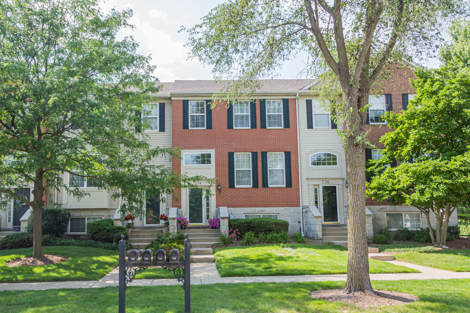 Lovingly cared for Bartlett townhome. Truly move in ready. A short walk to park, playground, bike path and dog park. Three bedrooms and 2 1/2 updated baths.  Master bedroom bath has double sinks, a large separate shower and soaking tub. Bonus room on lower level can be a fourth bedroom, office, work out space, craft room, toy room. Large laundry room. Lots of room to comfortably live. 9 foot ceilings, hardwood floors. New light fixtures throughout. Great natural light. Ceiling fans in all bedrooms. Oversized private balcony. Two car attached garage. Low monthly HOA. Easy access to major roads - Route 20, Route 59, Metra. Villa Olivia for golf and skiing is minutes away. Quick close possible.