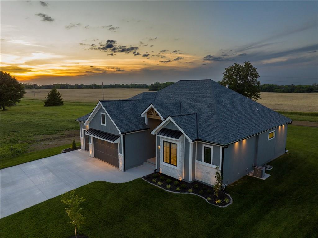 Step into a home where craftsmanship meets innovation, nestled in the heart of the Lake Winnebago community. From the moment you walk in, you’ll sense this isn’t just another house — it’s a custom-built masterpiece, designed for those who appreciate the finest details. 

Every inch of this 4-bedroom, 3-bath, 3,298 SF residence whispers luxury. White oak cabinets and wood accents provide a rich backdrop, while soft-close drawers, flush-mount cabinetry, and custom engraved light switches showcase Jameson Homes' meticulous attention to detail. Thoughtfully integrated LED backlighting creates ambiance throughout, setting the mood with personalized lighting scenes at your fingertips.  

Downstairs, you will find a media and game area, while a large storage space ensures everything has its place. The upgraded manifold plumbing system, Leviton electrical panel, and Hunter irrigation system reflect the high-performance engineering behind the walls.

Step outside to a covered porch perfect for morning coffee or evening gatherings, then explore all Lake Winnebago has to offer — boating, fishing, walking trails, horse stables, tennis and basketball courts, with a new community pool on the horizon.