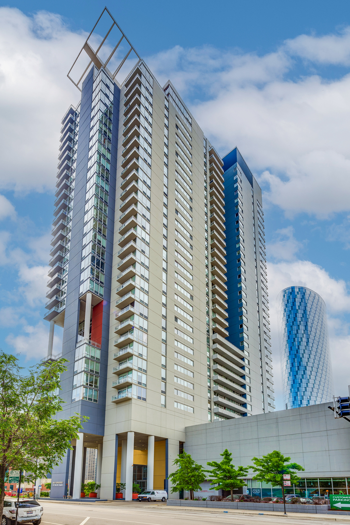 Stunning city views from this high-floor unit at Skybridge. Approximately 1800 square feet and only 1 of 2 units on the 36th floor, this oversized 2Bedroom/2Bathroom floorplan features floor-to-ceiling windows with southwest exposure providing tons of natural light. Other features included hardwood flooring, large living room with designated dining area, massive primary bedroom with on-suite bathroom & walk-in closet, laundry room with side-by-side laundry, and balcony. Modern kitchen with dark stained maple cabinetry, stainless steel appliance package, large island, and granite countertops. The primary bathroom features 6-foot soaking tub, separate shower, and double vanity. Prime deeded garage parking space located on the 1st floor available for 30K. The building was constructed in 2004 and is comprised of 237 residential units. Enjoy 24/7 door staff, exercise room, sundeck with city views, individual storage, dog run, and on-site property management. Direct access to Whole Foods downstairs, and easy walk to Randolph St, Fulton Market, public transportation and everything the West Loop has to offer. Special assessment paid in full by seller so new owner does not have to assume any cost.