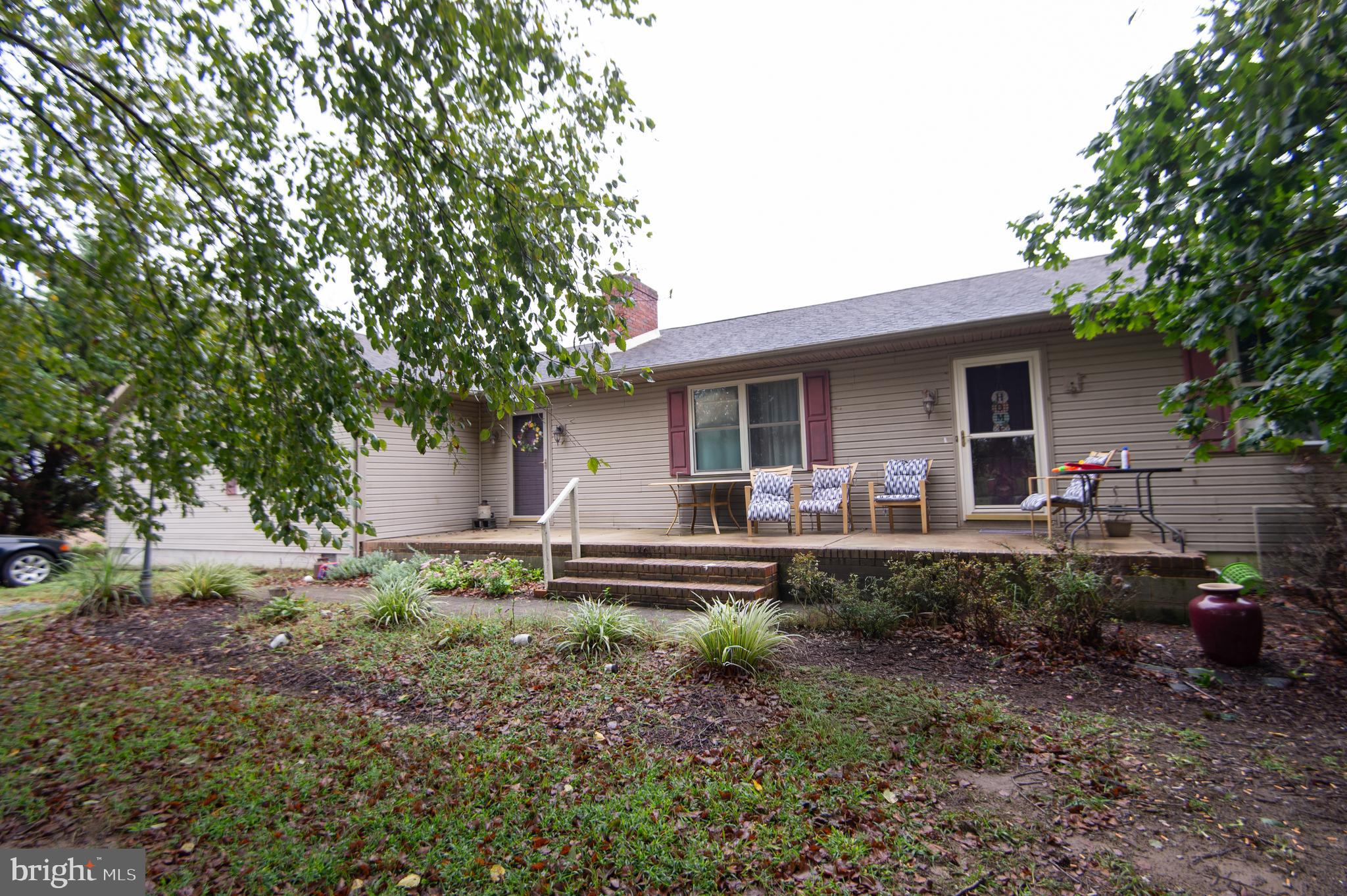 North Dorchester area. Large rancher on 1 +/- acre lot  The home feature 3 bedrooms and 2 baths plus an in- law suite with 2 bedrooms and 1 bath.  Detached 35 x 50 workshop with office area. Country location. Partially fenced yard.