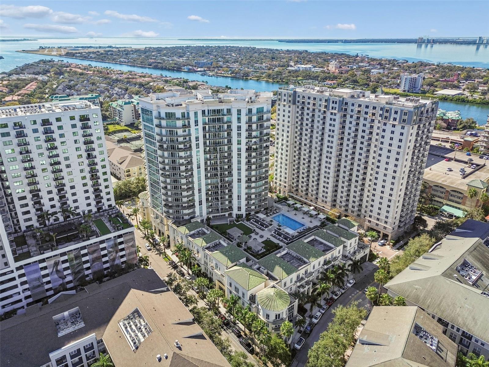Under contract-accepting backup offers. Virtually Staged. GORGEOUS “Casita” condo located in the beautiful and highly sought-after Plaza Harbour Island! This full-service luxury condo offers a true lock-and-leave lifestyle just minutes from downtown Tampa, complete with concierge service and valet parking for effortless everyday living.This amenity-level, two-story residence features interior stairs, soaring floor-to-ceiling balcony doors, and an abundance of natural light throughout. The open-concept layout seamlessly connects the kitchen, dining, and living areas, creating a space that is both functional and inviting — perfect for entertaining or relaxing at home.The gourmet kitchen is equipped with stainless steel appliances, 42” cabinetry, and generous counter space. Downstairs, the spacious primary suite features a private balcony and a spa-inspired bathroom with dual vanities and stylish finishes. A second bedroom with its own en-suite bathroom offers flexibility for guests, a home office, or additional living space, along with a convenient laundry closet.Two private balconies and a charming courtyard make this condo truly unique.Residents enjoy access to resort-style amenities, including a pool and hot tub, grilling areas, a resident lounge and meeting spaces, a fully equipped fitness center, spa, and sauna. Ideally located within walking distance to dining, entertainment, and everything downtown Tampa has to offer, while still maintaining a peaceful, tucked-away atmosphere. The property is also located within a highly rated school district.Recent updates include a new HVAC system and water heater, both replaced in 2024, offering added peace of mind for the new owner.Come experience the ease and luxury of Harbour Island living for yourself!