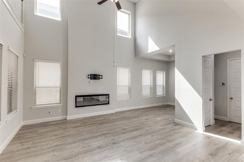 Nestled in the heart of the highly sought-after FRISCO ISD, this charming NORTH-facing PLANO home, built in 2021, perfectly blends modern design with everyday comfort. Step into the expansive double-height living area filled with natural light, seamlessly connecting to a stylish and functional open-concept kitchen and dining space. The kitchen features granite countertops, stainless steel appliances, a GAS cooktop, WATER SOFTNER SYSTEM and ample storage—ideal for both daily living and entertaining. The first floor boasts a spacious primary suite and a dedicated office located near a convenient half bath. Upstairs, you’ll find a secondary bedroom with an en-suite bath, two additional bedrooms connected by a Jack-and-Jill bathroom, a large game room, and an adjacent media room—offering plenty of space for relaxation and entertainment. Enjoy a low-maintenance backyard enclosed by a wood privacy fence. Located just 25 minutes from downtown Dallas, this home offers the best of both worlds: tranquil suburban living with easy access to major shopping centers, dining, and top employers—making daily errands and commuting effortless.