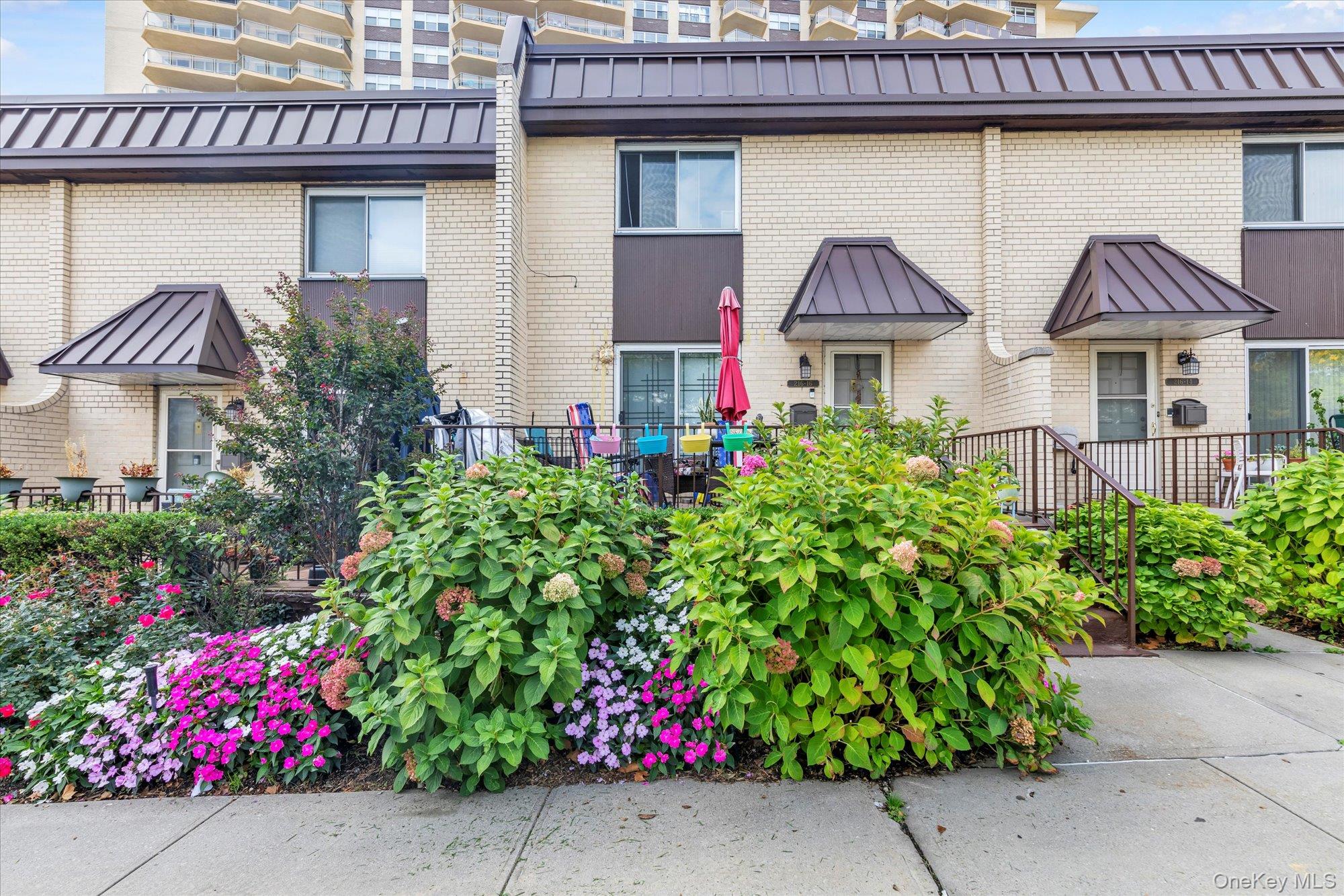 3-Level Townhouse at Water’s Edge – Space, Lifestyle, Resort-Style Amenities & School district # 26. Welcome to 216-16 17th Avenue in Water’s Edge—where you come to upgrade not just your home, but your entire lifestyle. Located in desirable Bay Terrace, this rare 3-level, 3-bedroom co-op offers the kind of space and functionality that’s nearly impossible to find in Manhattan or Brooklyn at this price point. Inside, you’ll find expansive living across three floors -  the first floor has a beautiful gourmet kitchen with lots of counter space and storage, stainless steel appliances and a sleek breakfast bar. The dining room is accentuated by sliding doors to the private patio. A convenient powder room makes entertaining easy. The huge living room has high hat lighting and an exit to the Water's Edge grounds, which offer water views and a plethora of amenities as soon as you enter the manicured grounds.  The second floor layout consist of a large primary bedroom suite with private bathroom, and two additional bedrooms facing the quiet back. There is also a hallway bathroom with soaking tub. The finished basement adds enormous flexibility, perfect for an office, playroom, home gym, media space, or guest bedroom. It also holds the private laundry area with a washer and dryer. What truly sets this home apart is the lifestyle: Here, you’re not just in a neighborhood—you’re in a community designed for living well: *Easy access to Manhattan - LIRR and express bus *Private pool for summer days *Fully equipped gym on the grounds *Tennis & pickleball courts for active living *Playground to grow, play and connect. * Bell Academy and PS 169. An additional  new school is being built in Bay Terrace.*Bay Terrace Shopping center with amazing restaurants, super market, a movie theater and soon a Barnes & Noble! This is the kind of environment where weekends feel like a getaway, and daily life feels calmer and more balanced. This isn’t just a home—it’s a lifestyle upgrade with built-in value.