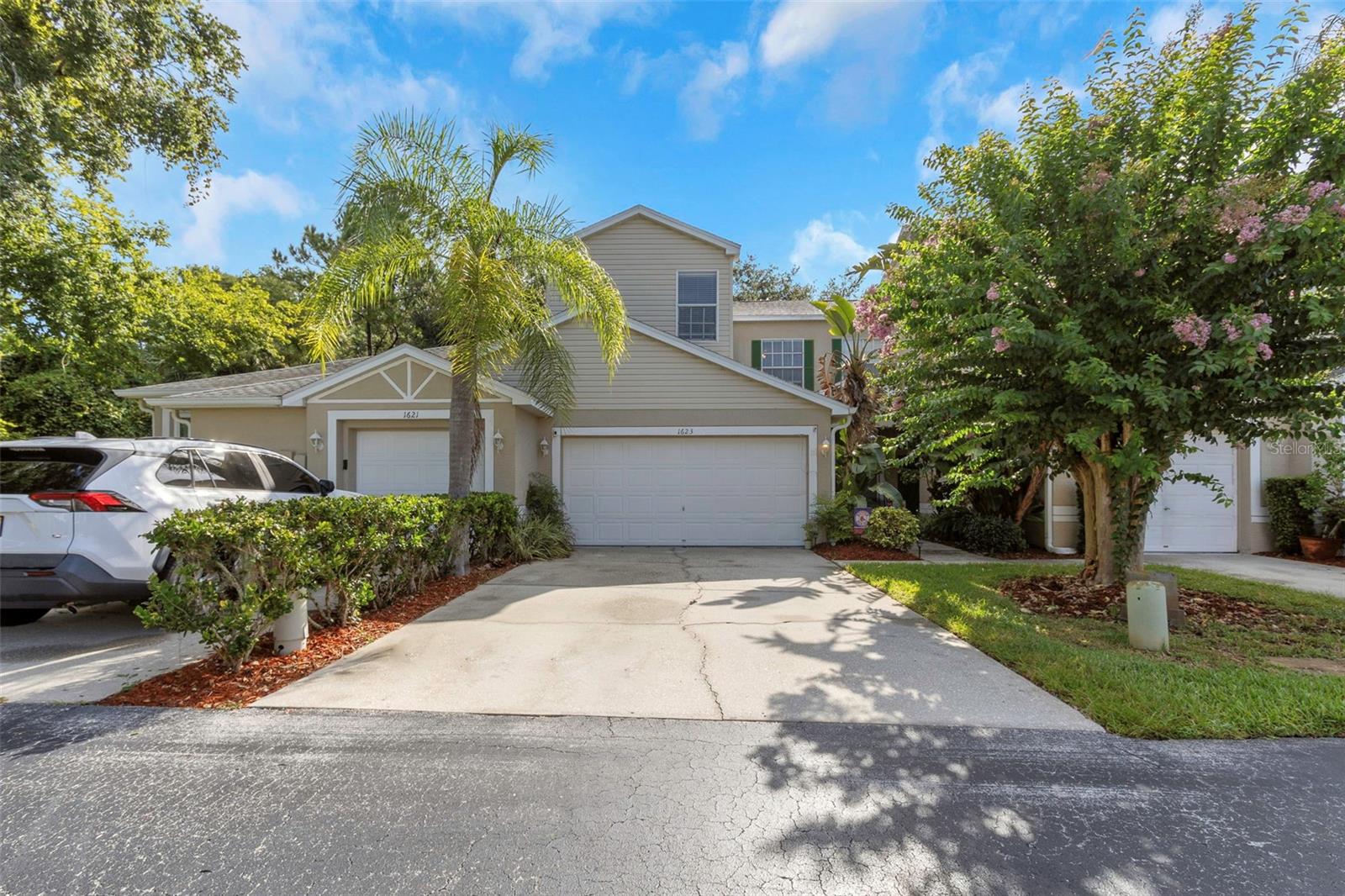 This beautifully updated home offers style, comfort, and convenience in the sought-after community of Tarpon Springs. Featuring a spacious open layout and a versatile bonus loft area, it’s the perfect space for entertaining guests, hosting game nights, or creating your dream home office.  The modern kitchen boasts updated finishes, while the main living spaces are filled with natural light and stylish touches throughout. Upstairs, the bonus loft adds flexible living options to suit your lifestyle.  Enjoy all the benefits of a community pool just steps from your door—without the maintenance—plus the peace of mind of being outside the flood zone. Conveniently located near shopping, dining, beaches, and the historic charm of downtown Tarpon Springs, this home is ready for you to move right in and start living the Florida lifestyle