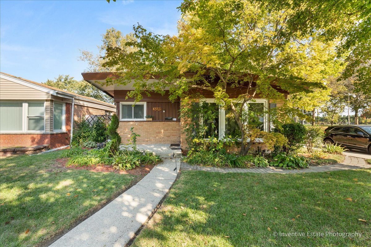 Welcome home to this well-loved 3-bedroom, 1-bath ranch in Chicago's sought-after Wrightwood neighborhood, just steps from beautiful Hayes Park! Thoughtfully cared for by longtime owners, this home is full of warmth and opportunity. Enjoy comfortable single-level living, a detached garage with a storage/office area, plus an extra storage room attached to the house. The spacious yard is perfect for relaxing or entertaining. With a little vision and TLC, this solid home can easily become your dream space.   Garage Roof - August 2025  Wood burning fireplace  Wood laminate flooring throughout, approximately 3 years old  Stainless Steel Fridge, dishwasher, stove  Washer included  Windows replaced in 2023  Furnace and A/C replaced in 2023 and serviced by Four Seasons  Located near schools, shopping, and public transportation. A wonderful find in a fantastic location - come see the potential today!
