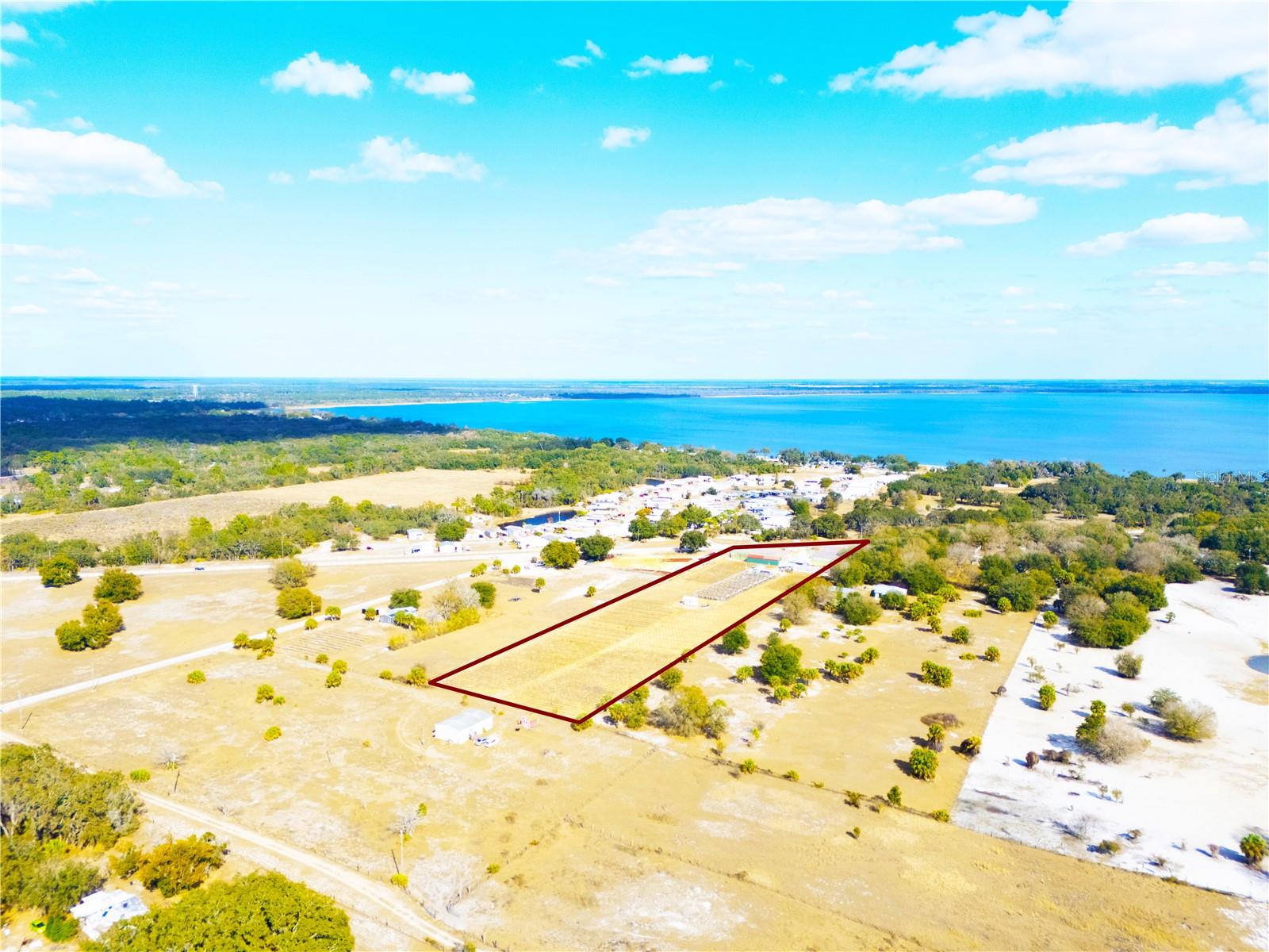 Located just 16 minutes from the heart of Lake Wales, Florida, this nearly 5-acre organic farming operation presents a rare opportunity to acquire a turnkey agricultural business with expansion potential. The operation is situated in a well-known agricultural and recreational area, near the Lake Aurora Christian Camp and Retreat Center and just minutes from Lake Weohyakapka (Walk-in-Water), home to Uncle Joe’s Fish Camp and the growing community of Indian Lake Estates.The farm is conveniently located on Walk-in-Water Road, just off Highway 60—one of Florida’s primary east–west corridors—providing excellent access for transporting goods to market throughout Central and South Florida.Included in the offering are the existing organic crops and all on-site operational improvements and infrastructure. The operation features a fully developed organic farming setup, including irrigation piping, pump house, pump system, generator, propagation tank, and multiple support buildings. Newly installed hydroponic buildings are in place, with systems expected to be fully operational by March 2026, along with new plants scheduled for installation at that time.The farming operation is currently run by a tenant under a lease-to-own agreement with the property owner, creating an attractive opportunity for an owner-operator or investor seeking an established business with a defined path to long-term site control.