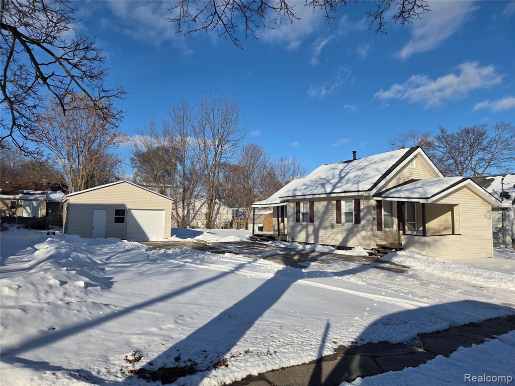 Updated 1-bedroom, 1-bath home.A brand new roof on both the home and garage. New flooring throughout.New bathroom with 1st floor laundryThe kitchen features a gas stove. Includes a gas furnace and gas water heater. Large walk-in closet Large Pantry off kitchenThe exterior features a large concrete parking area with room for multiple vehicles, trailers, or equipment, plus a detached insulated and drywalled 20´x 20´garage ideal for storage, workshop, or hobby use.Convenient location near a CATA bus stop with USPS porch delivery. Minutes from Eastwood Towne Center, shopping, dining, downtown Lansing, and major roadways.Highlights: 1 bed / 1 bath 768 sq ft 9,147 sq ft lot New roofs (house & garage) New flooring Gas stove, furnace & water heater First-floor laundry Detached insulated drywalled garage