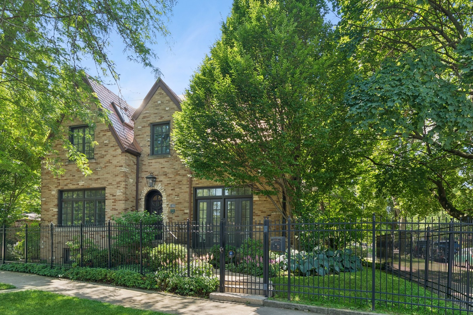 Once-in-a-lifetime opportunity!  Absolute perfection and attention to detail!  This stately Tudor home has been completely refurbished and reimagined with no detail overlooked and no expense spared!  A designer showcase of stunning architectural details with high-end, custom finishes throughout.  Versatile floorplan with several bedroom and in-home office space options.  Supreme location right off the park and seamless proximity to everything; Lincoln Square, North-Side/North Shore, downtown, uptown - you name it!   Excellent tier-one schools; Jamieson & Northside College Prep!     Updates and upgrades include: (New everything) New roof, new Pella windows throughout, new custom kitchen with Subzero & Bosch appliances, new baths, new mechanicals, electrical, water filtration system, new floors, heated patio, built-in custom storage, new floors, French tile flood-proofing.