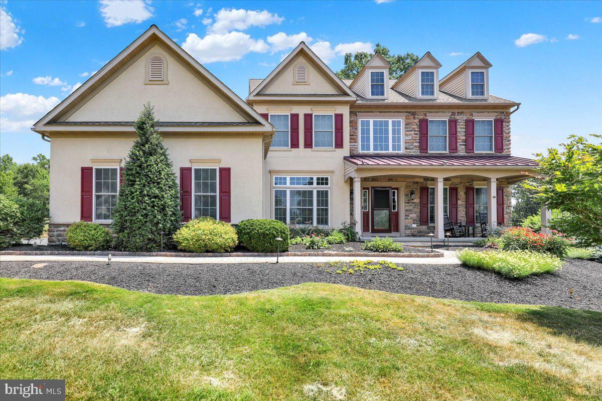Welcome to exceptional luxury living in this beautifully maintained 5 bedroom, 4.5 bathroom home offering over 4,400 square feet of thoughtfully designed living space, plus more than 1,000 additional finished square feet in the walk out lower level. From the moment you arrive, you will appreciate the pride of ownership, mature landscaping, and impressive curb appeal. Step inside and prepare to be amazed by a home that feels like a professionally designed model, blending timeless elegance with today's sought after contemporary style.Natural light fills the spacious interior, highlighting some newer carpeting, fresh paint in select areas, stylish barn doors, and an open, inviting floor plan. The main level is designed for both everyday living and entertaining, featuring a welcoming living room, elegant dining room, private home office, spacious family room with a stunning floor to ceiling propane stone fireplace, bright sunroom, convenient first floor laundry, and a beautifully updated kitchen. The kitchen is a true centerpiece with granite countertops, a large center island, pantry, gas cooking, and abundant cabinetry, making it perfect for preparing meals while staying connected with guests.Two separate staircases provide convenient access to the second level, where the open hallway overlooks both the grand foyer and the impressive family room below. The luxurious primary suite serves as a private retreat with a spacious walk in closet and a beautifully appointed ensuite bathroom. Three additional generously sized bedrooms complete the upper level.The finished walk out lower level offers more than 1,000 additional square feet of exceptional living space, complete with a fifth bedroom, full bathroom, dedicated exercise area, and an expansive recreation and entertaining space. An additional unfinished storage area provides plenty of room for seasonal items, hobbies, and organization.Outdoor living is equally impressive. Relax on the expansive deck with a power retractable awning, enjoy peaceful mornings in the screened porch, or gather around the fire pit while taking in the beautifully landscaped corner lot. A three car garage provides ample space for vehicles, storage, and recreational equipment.Every detail of this exceptional home has been thoughtfully maintained, creating the perfect balance of luxury, comfort, and functionality. Offering over 5,400 square feet of finished living space, designer finishes, abundant natural light, and exceptional indoor and outdoor entertaining areas, this remarkable property is truly move in ready and an opportunity you will not want to miss.