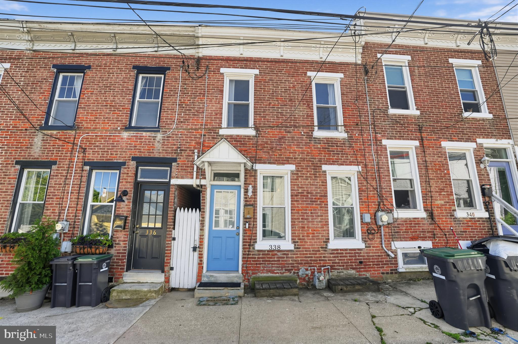 Welcome to 338 Grover Street featuring one of Phoenixville Borough’s most sought-after lifestyles. Located just seven blocks from the heart of downtown Bridge Street, this charming 2-bedroom, 1-bath row home puts restaurants, shops, entertainment, community events, and everything that makes Phoenixville special within easy reach.Enter this approx.1,118 sf 1920 home and you'll immediately appreciate the warmth and character of the original hardwood floors, private courtyard, and desirable location. The updated kitchen provides a fresh, functional space for everyday living, while the updated full bath blends modern convenience with the home's historic appeal.Upstairs, you'll find two bedrooms along with a mini-split system providing air conditioning where you need it most. An additional flexible space offers possibilities such as a home office, cozy sitting/library area, hobby space, extra storage, or even an opportunity for future alteration.Out back, discover a private fenced courtyard—a wonderful spot for morning coffee, outdoor dining, gardening, or relaxing at the end of the day. Convenient gated access adds functionality, while the home's unique "morning steps" provide another touch of the character and history that make this property anything but ordinary.Additional features include efficient gas heat and convenient on-street parking and offers a 1 year Assurant Home Warranty for buyer peace of mind.Built in 1920 and surrounded by a neighborhood rich in history, 338 Grover Street offers more than simply a place to live—it offers the Phoenixville lifestyle. Enjoy weekends exploring downtown, local restaurants and breweries, browsing independent shops, or taking part in the festivals and community events that have made Phoenixville one of the region's most vibrant destinations.