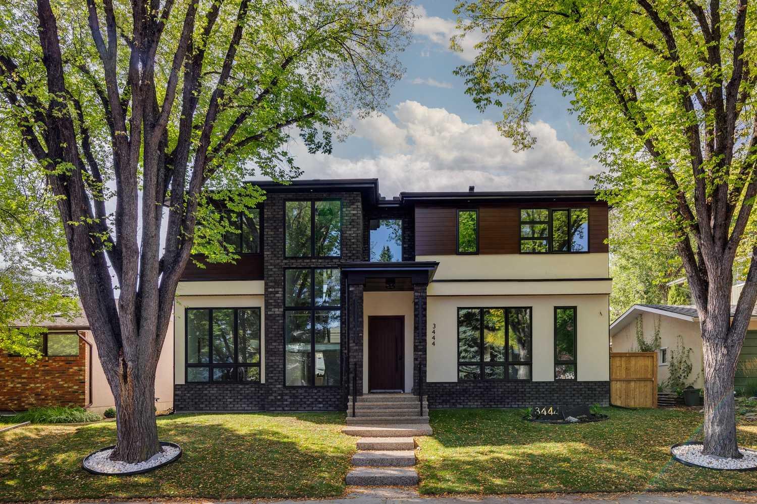 ** Open House SundayJanuary 18th from 2pm-4:30pm! ** Introducing a brand-new luxury estate home in the highly sought-after community of Lakeview. Ideally situated on a quiet crescent with a sunny west-facing backyard, this property is perfect for growing families. Boasting 3,558 sq. ft. above grade and 5,385 sq. ft. of fully developed living space, it offers a total of 5 bedrooms and 5 bathrooms. The home will feature white oak hardwood flooring on all three levels, central air conditioning, in-slab heating in the basement, and in-floor heating in the primary ensuite. The main floor includes a spacious mudroom, an open-concept living room and kitchen with island seating and a dining nook, a formal dining room with a large butler’s pantry, and a private office. The upper level offers a centrally located bonus room, laundry area, and 3 bedrooms, including a luxurious primary suite massive walk in closet & a spa-inspired en-suite including in floor heat and steam shower. The fully developed lower level includes 2 additional bedrooms, a full bathroom, gym, rec area, storage, and a wet bar. A heated double garage sits at the rear, Property is fully landscaped & ready for occupancy! Schedule your private viewing today!