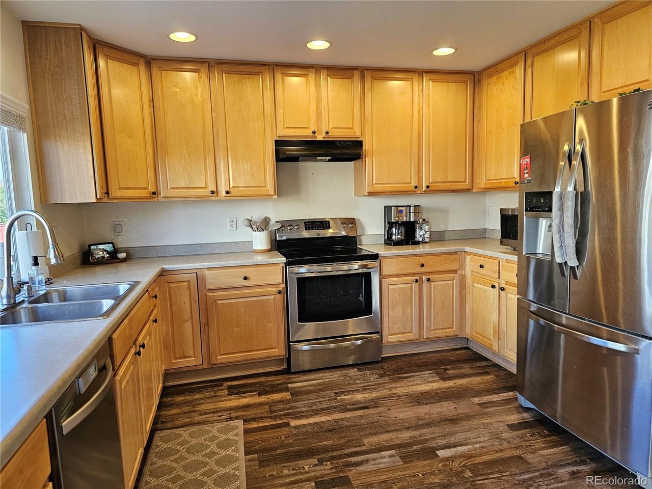 Ask About Seller-Paid Concessions & Discount Points! Seller incentives may be available to help with closing costs or lower your interest rate, reducing your monthly payment. Spacious 4-bedroom home with all bedrooms conveniently located on the upper level.   This well designed floor plan features 3 bathrooms, a versatile loft, and an unfinished basement offering room to expand. The primary suite offers a vaulted ceiling, generous walk-in closets, and a luxurious 5-piece bathroom. Additional highlights include a 3-car garage, brand new carpet, a cozy gas fireplace, and formal dining area.   Step outside to a low-maintenance Trex deck-perfect for entertaining-while enjoying close proximity to scenic trails and parks.