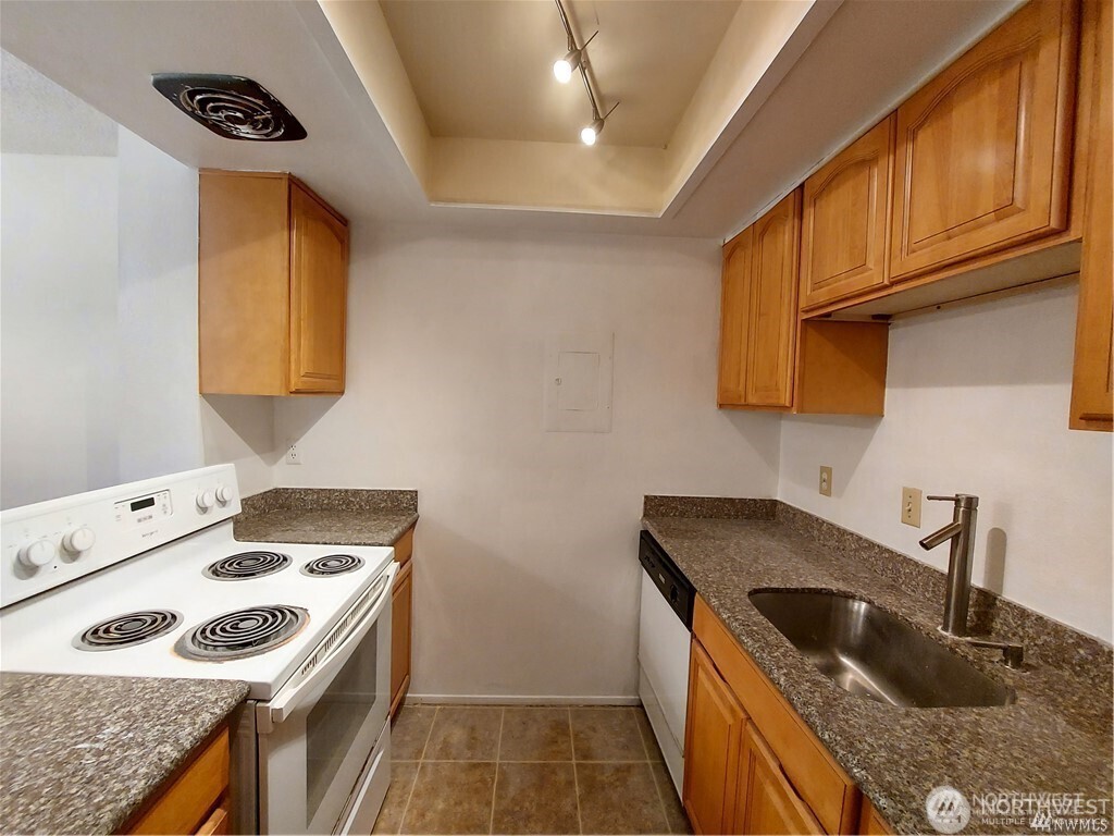 *No rental cap*.  No special assessments.  Owner occupancy rate. (Percentage of owner occupied residential homes/units.) 85.70%  Top floor, rooms facing East with nice nature lights. Great Bellevue Schools. Walk to Microsoft. Close to light rail station,I-520, bus lines, shopping centers, park. large walk-in-closet in bedroom. Plus A deck off the living room. Community pool,  Athletic Court, Garden Space for you to enjoy life. More time for fun things than being stuck in traffic. Resale Cert ordered.