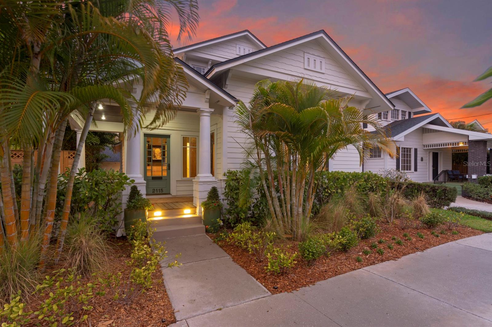 Perfectly positioned in desirable Hyde Park,  this 2006-built Craftsman-style home blends timeless architectural charm with elevated, designer-driven living. Offering 3,146 square feet of thoughtfully curated space, this two-story residence delivers sophistication, warmth, and effortless livability at every turn.  From the moment you enter, soaring foyer ceilings create a dramatic first impression.  The kitchen is perfectly placed between the front dining space and the rear family room, creating a seamless flow ideal for both intimate gatherings and lively entertaining. Designed to impress, the first floor showcases a custom bar adorned with imported Zellige tile and a striking self-sustaining living plant wall that brings organic texture and artistry indoors.  Outdoor living is equally exceptional. A generous side yard and inviting side porches with custom seating and bubbling fountains imported from Morocco create a private oasis perfect for relaxing evenings or hosting guests under the Florida sky.Upstairs, the expansive primary suite is a true sanctuary. Enjoy your own private terrace, a custom-built acacia wood walk-in closet, and a spa-inspired en-suite bath featuring dual vanities, a soaking tub, and a marble walk-in shower. Two additional upstairs bedrooms each offer newly renovated en-suite baths, providing comfort and privacy for family and guests alike. A full-size laundry room completes the upper level with convenience and functionality.  The detached, climate-controlled two-car garage offers flexibility as a studio, gym or flex space.  An electric gate and additional paved parking provide rare and valuable off-street accommodations.  Recent updates to the home include a new roof (2026), newer kitchen appliances as well as two fully remodelled bathrooms. Enjoy an unrivaled location just steps from Hyde Park Village, Bayshore Boulevard, and the iconic Bern's Steak House, along with top-rated schools including Mitchell Elementary School, Wilson Middle School, and Plant High School.   Reach out today to schedule your private showing.