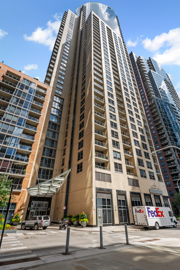 Experience the turnkey Residence 1814, a true 3 bedroom and 3 full bathroom, northeast corner residence at the Regatta tucked into the heart of Lakeshore East with unobstructed and permanent views of the Chicago River, Chicago's skyline and some of he most iconic and important buildings of the 1920s and 1930s Renaissance periods like the Merchandise Mart, Chicago Tribune Tower, Intercontinental Hotel an more modern structures of the last 25 years north of the river. Exquisite twilight and night time views north, west and east along the river and towards Lake Michigan and Navy Pier, Ohio Street Beach. Jut under 2000 square feet, Residence 1814 offers a formal entry, all hardwood floors throughout, open kitchen concept featuring chef's kitchen, 1.25" bullnosed granite counters, raised bar, KitchenAid stainless steel appliances, 42" all wood cabinetry with crown, glass panes, abundant storage space and drawers, open to living and separate dining areas, clear views to the lakeside. Floor to ceiling windows, balcony off living space. Staggered guest suite with ensuite bathroom off to the side, split apart from primary and second bedrooms. Custom lighting throughout from Lightology. Side by side washer and dryer. Sumptuous 22'x23' living and dining space combined. Each bathroom dressed in flor to ceiling natural marble stone. Primary bathroom with dual vanity, under mount sink, all wood vanity, separate shower and soaking tub, recessed medicine cabinets. Walk-in closet. Views from each room. This is a full amenity building with 24 hour doorstaff, onsite management, maintenance, engineer and property manager. Dry cleaners, library and common room, hospitality. Indoor lap pool, locker rooms, whirlpool, state of the art complete and comprehensive gym, beautifully outfitted hospitality room for private events, billiards room. Well funded with over $3.1M in reserves for 302 units. No special assessments. two side by side garage parking spaces (P4-263 and P4-264) included in the list price.