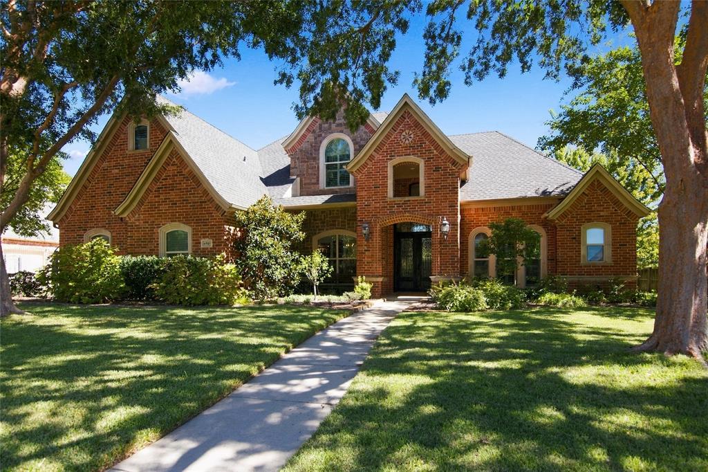Beautifully appointed Colleyville home in highly sought-after KELLER ISD, situated on a 0.40-acre cul-de-sac lot backing to a peaceful 5-acre estate property. This 4-bedroom, 4-bath home offers exceptional privacy and an entertainer’s dream backyard featuring a pool, spa, outdoor kitchen, and lush landscaping. Excellent floor plan featuring a spacious primary suite with an oversized closet and secondary bedroom downstairs, plus two additional secondary bedrooms upstairs. Each bedroom offers the convenience and privacy of its own full bathroom. Open kitchen and family room with large island, stone fireplace and a wall of windows. Triple-pane vinyl windows across the back of the home and double-pane vinyl windows, and plantation shutters in the front provide added energy efficiency and comfort. Pool equipment is approximately 1 year old. HVAC units are approximately 3 years old, and are still under warranty. The home also has tankless water heaters. Located in a community packed with amenities including a clubhouse, pool, greenbelt, trails, park, playground, and tennis and pickle ball courts, and just minutes from shopping, dining, and schools, this home checks every box for luxury and convenience.  A rare combination of space, privacy, and resort-style outdoor living in one of Colleyville’s most desirable neighborhoods.