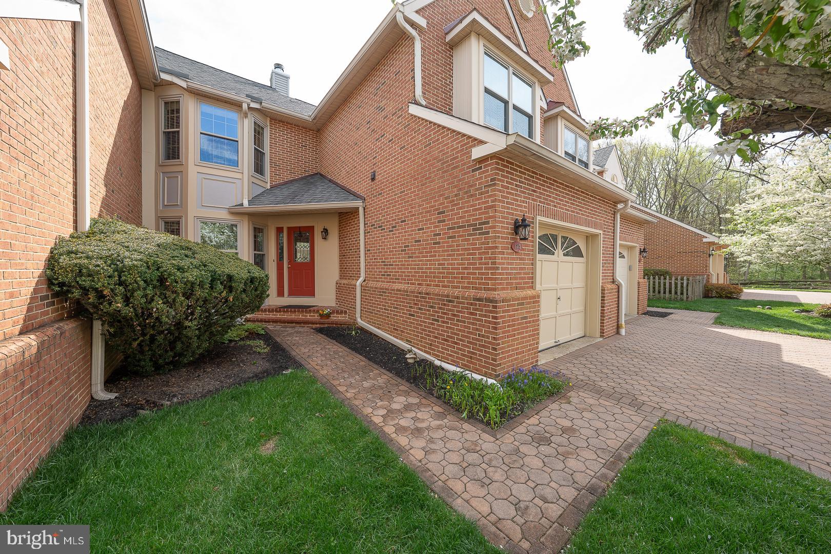 Welcome to 125 Springton Mews—ideally positioned on a quiet cul-de-sac with peaceful open space views in the heart of desirable Marple Township. Offering 3 levels of comfortable and well-maintained living space, this 3-bedroom, 3 full and 1 half-bath townhome presents a wonderful opportunity for easy living and entertaining in a sought-after community.Thoughtfully updated, the home features hardwood flooring across the main and upper levels, crown molding, recessed lighting, and an inviting, neutral palette. The entry foyer with tile flooring leads into step-down living room with hardwood floors and a cozy fireplace.  The sun filled dining room offers classic detailing with chair rail and crown molding. The updated kitchen includes granite countertops, hardwood floors, and a breakfast area with a triple window that overlooks the open space. This level is completed by a powder room, generous storage closets, and interior access to the attached garage.Upstairs, the spacious primary suite offers a large walk-in closet, two additional closets, and a dressing area with granite-topped vanity. The en-suite bath includes double sinks and a walk-in shower. A second bedroom, full hall bath, linen closet, and convenient second-floor laundry complete this level.The finished walk-out lower level expands the home’s living space with a bright family room featuring sliding doors to a covered patio overlooking open space. A third bedroom and full bath provide flexibility for guests, extended family, or a private home office.   A large utility room and a walk-in cedar closet complete this level.Located just minutes from downtown Media and Newtown Square, with easy access to shopping, dining, and major routes, this is a fantastic opportunity to enjoy low-maintenance living in a prime location.