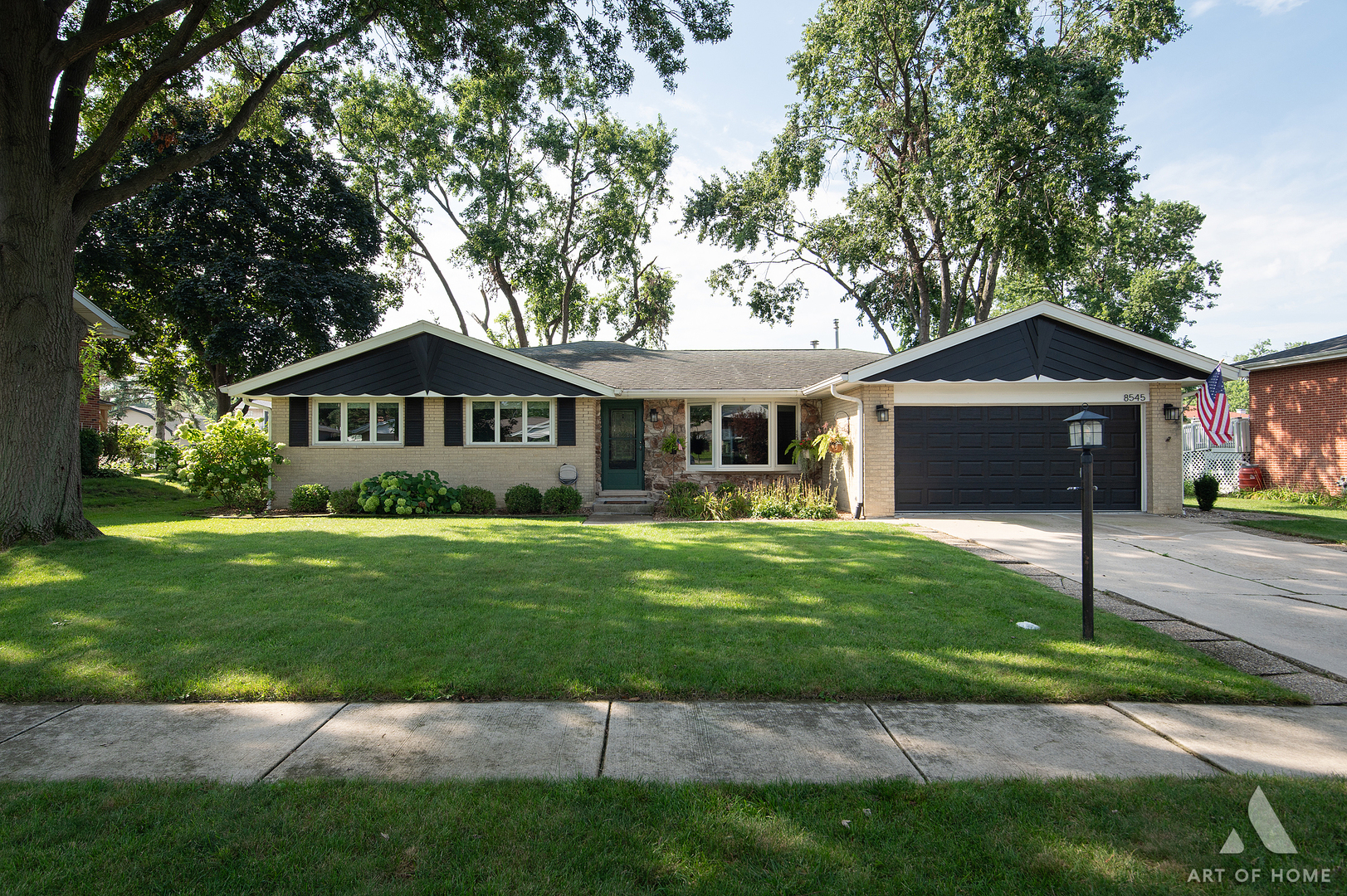 Welcome home to this updated brick ranch in one of Orland Park's most convenient, quiet pockets. Open living, hardwood floors, vaulted ceilings, and a remodeled kitchen with custom oak cabinetry, slow-close drawers, granite, wet bar, and stainless KitchenAid appliances. The family-room addition is the heart of the house - fireplace, soaring ceilings, walls of windows, and a walk-out to the patio and backyard, built for grilling and weekend hangouts. Primary suite with dual closets and a private bath featuring a soaking tub plus separate shower. Two oversized additional bedrooms plus a flexible office/play/flex room off the kitchen with its own bath. Attached 2-car garage that's EV-ready, a generous lot, and a location that puts parks, shopping, dining, and Sandburg District 230 within walking distance or an easy drive. One-level living that actually lives big. Move-in ready - come see it.