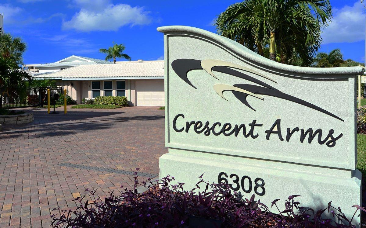 Dont Miss this one' beachfront Unit at Crescent Arms on beautiful Siesta Key. Wake up to the sound of gentle waves and step directly onto the powdery white sands of world-renowned Siesta Key Beach from this beautifully fourth floor unit. Perfectly positioned for effortless coastal living, this 2-bedroom, 2-bath unit offers Gulf views and a short walk-out to the beach. The open-concept layout is bathed in natural light, featuring a spacious living area that flows seamlessly to the screened lanai, you can enjoy sunsets over the Gulf . This unit was updated several years ago with solid-surface countertops, tiled floors through out and ample storage making it ideal for both full-time living and vacation stays. The primary suite boasts ample room for a king bed which will boost rental income and a private ensuite bath, while the guest bedroom and bath provides comfort and privacy for family or visitors. Crescent Arms offers resort-style amenities, including a heated beachside pool, private beach lounges, grilling area, and gated access for security and peace of mind. Located on Siesta Key, this community is within minutes of Siesta Key Village, shops, restaurants, and island nightlife. Whether you’re seeking a serene retreat, an investment property with excellent rental potential, or your forever beach home, this beachfront gem delivers the ultimate Siesta Key lifestyle. Recent upgrades include new AC system. This unit has a Strong rental history.