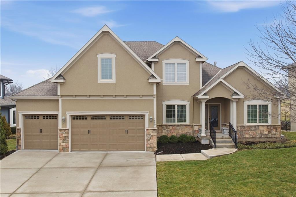 Nestled in the highly desirable Creekmoor community in Raymore, this home offers the lifestyle buyers are searching for — championship golf, a clubhouse, pool, walking trails, and a true neighborhood feel where people actually know their neighbors. Notably, this property represents one of the lowest price-per-square-foot opportunities on the golf course compared to recent sales, making it an exceptional value in today’s market. Perfectly positioned on the golf course along a long par 5 with water, the property enjoys sweeping fairway views from multiple vantage points, creating a backdrop that makes everyday living feel a little more special.Inside, you’re welcomed by a dramatic two-story entry and formal dining room that set an elegant tone. The main level is thoughtfully designed with a spacious primary suite plus a second bedroom that functions beautifully as a den, office, or guest room, with a full hall bath just steps away. The kitchen is built for gathering, a granite island with gas cooktop, generous prep space, and a bright breakfast area that flows seamlessly into the living space and out to the screened-in porch and patio overlooking the course.Upstairs, a large loft opens to a newer deck with golf course views, along with two generously sized bedrooms connected by a Hollywood bath. The finished lower level is poised for entertaining, offering a full granite-topped bar with sink and full-size refrigerator, a tiled 450-bottle wine room, space for game tables, and a media room set up for projector and surround sound. A fifth bedroom with egress and a fourth full bath complete the lower level, making it ideal for guests or extended stays.With three-zone damper-controlled HVAC, ceiling fans throughout, sprinkler system, and central vacuum, this home offers exceptional comfort, flexibility, and one of the premier golf course settings in Creekmoor — at a price point that stands out from recent comparable sales.