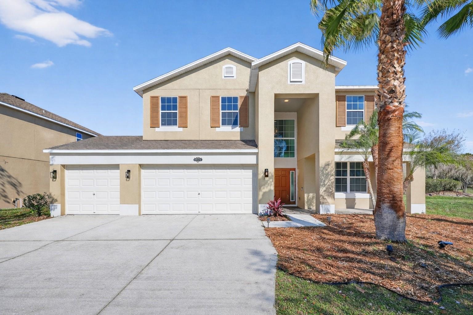 Welcome to this beautiful 5 bedroom, 3 bathroom + Den home located in the highly desirable community of Eaton Park in Tampa. Situated on a spacious fenced-in lot, this home offers impressive curb appeal with manicured landscaping and a welcoming exterior. Inside, luxury vinyl flooring and an open-concept layout create a bright and functional living space. The kitchen features stainless steel appliances and ample cabinetry, perfect for everyday living and entertaining. Each bedroom is filled with natural light and includes ceiling fans for added comfort. Multiple rooms have full walk-in closets. The primary suite offers a relaxing retreat with a sit-in tub and a glass-enclosed walk-in shower. Sliding glass doors lead to the private fenced backyard, providing plenty of room for gatherings, outdoor enjoyment, and sunset views. Additional highlights include a three-car garage for extra storage and convenience, a sizable den for a office or game-room, and a formal dining room. Eaton Park offers fantastic community amenities, including a pool, playground, dog park, and more. Conveniently located near Tampa’s shopping and dining destinations and just minutes from I-75, this home provides easy access to everything the Tampa Bay area has to offer.