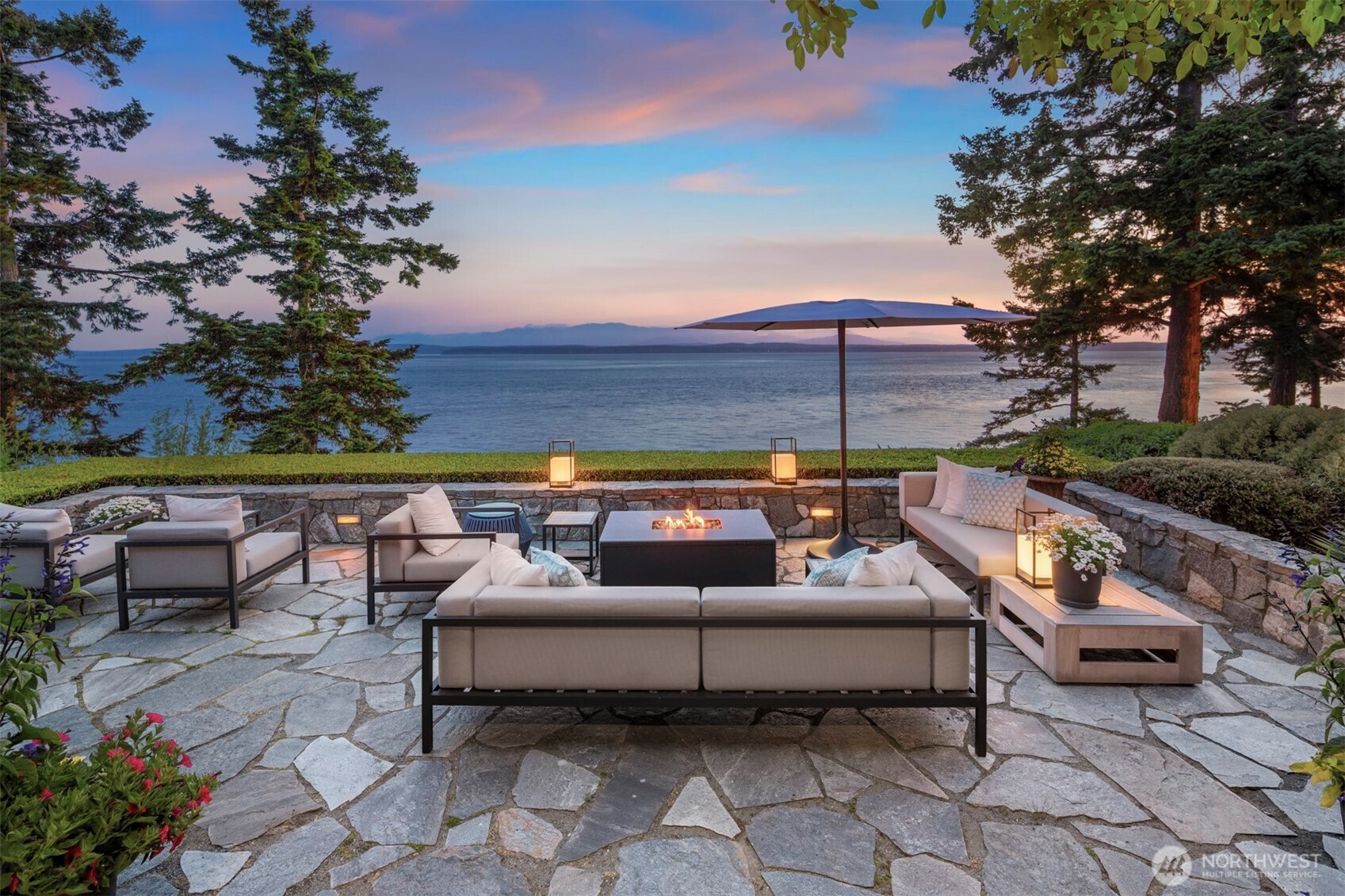A truly exceptional 21-acre waterfront sanctuary, bordered by 16-acres of protected reserve. This island retreat lives like a private arboretum, offering unmatched privacy, natural beauty & sophistication. A meticulous remodel by Christian Grevstad has transformed the residence into a harmonious blend of timeless elegance and contemporary comfort. The property features four thoughtfully designed buildings, incl. a 5,214 sf primary residence, a 2,774 sf 'studio' building, 856 sf guest cottage & 413 sf cabin, for over ~9200 total sf. The grounds are equally remarkable w/ 246' of shoreline, pickleball court, walled garden, reflecting pool and sweeping western views of the Olympic Mts and Puget Sound. Visit virtual tours for additional content.