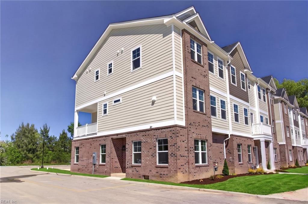 Move in Ready! Welcome to your dream townhome in the heart of Hampton Roads, easy access to shopping, interstate, dining and centrally located, literally close to everything! This stunning 2056 sf home features 3 stories of modern living. Entry level bedroom perfect for home office, guests or in-laws. Expansive open living space on the second floor incl. dream kitchen w huge island, large family room opens to a covered porch and a large dining area off the kitchen. Retreat to the 3rd floor stylish Primary Bedroom w/ an ensuite that includes a full tile shower, double vanity w/Granite or Quartz Counters and LVT flooring. 2 additional bedrooms and a full bath round out the top floor. Granite or Quartz counters throughout, 9' ceilings, tankless gas water heater and lots of recessed lighting, the list goes on. This home is built with Quality in mind and offered at a fantastic price.