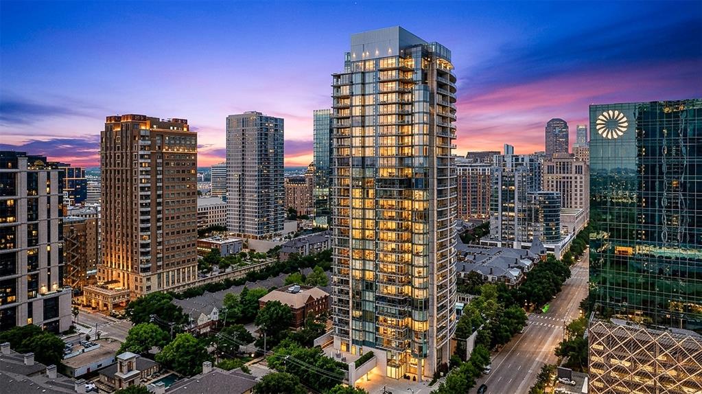 Nestled in the vibrant Harwood District, The Azure offers a premier high-rise living experience in the heart of Downtown Dallas. This residence boasts a prime location surrounded by top-tier dining, curated retail, and lively nightlife, making it perfect for those seeking a seamless urban lifestyle. The interior is marked by expansive floor-to-ceiling windows that showcase breathtaking skyline views and the resort-style pool below, offering a dramatic cityscape from almost every angle. The modern design features clean architectural lines, wood floors and a chef's dream kitchen equipped with high-end Miele and Sub-Zero appliances. This open concept design seamlessly blends the kitchen, dining, and living areas, creating a versatile space that is optimal for entertaining guests and hosting gatherings. The primary suite is a sanctuary with a spa-like bath adorned in marble for a sophisticated finish. From the primary bedroom, step out onto one of two spacious terraces, providing an ideal setting for sipping evening cocktails or savoring a morning coffee. This balcony boasts a cozy gas fireplace and provides a view of the glistening pool, creating a tranquil atmosphere perfect for relaxing while taking in the city's sparkling lights. The guest suite ensures privacy and comfort with its own full size bath. A private two car garage plus a separate storage area adds a rare touch of convenience & luxury in a high-rise. Residents enjoy top-notch, full-service amenities, including a 24-hour concierge, fitness center, sauna, library, charging station, car wash as well as a theater room, making The Azure an appealing choice for a primary or secondary home. Valet service available for residents and guests. Enjoy the urban lifestyle with close proximity & walkability to the American Airlines Center for Mavericks game, Dallas Stars hockey & concerts. Combining design, location, and upscale service, this home exemplifies refined Dallas living for the most discerning residents.